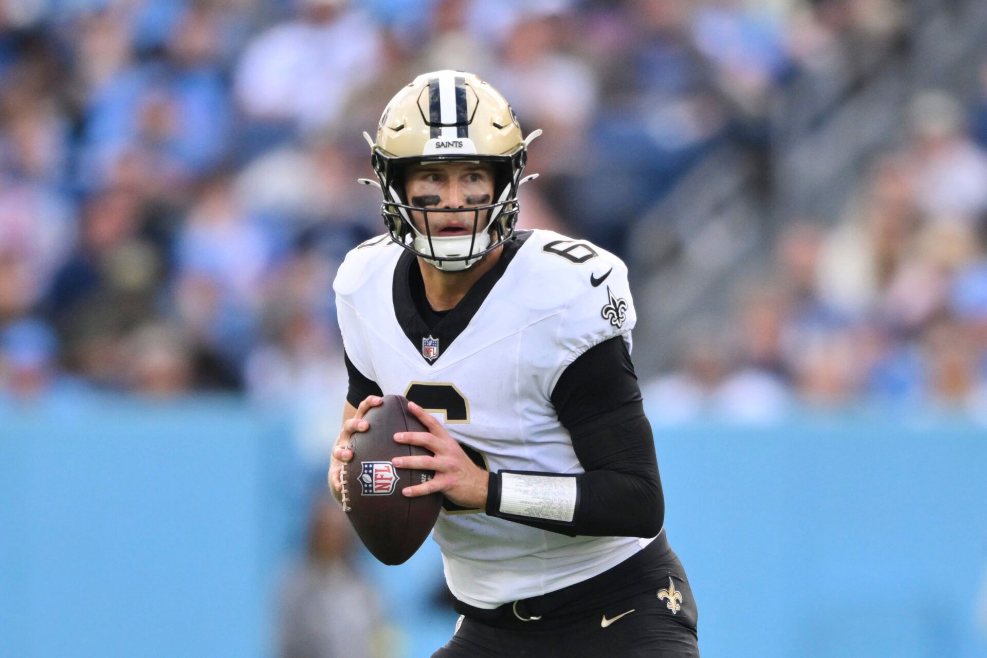 New Orleans Saints quarterback Tyler Shough (6) looks to pass against the Tennessee Titans during the second half of the game at Nissan Stadium.
