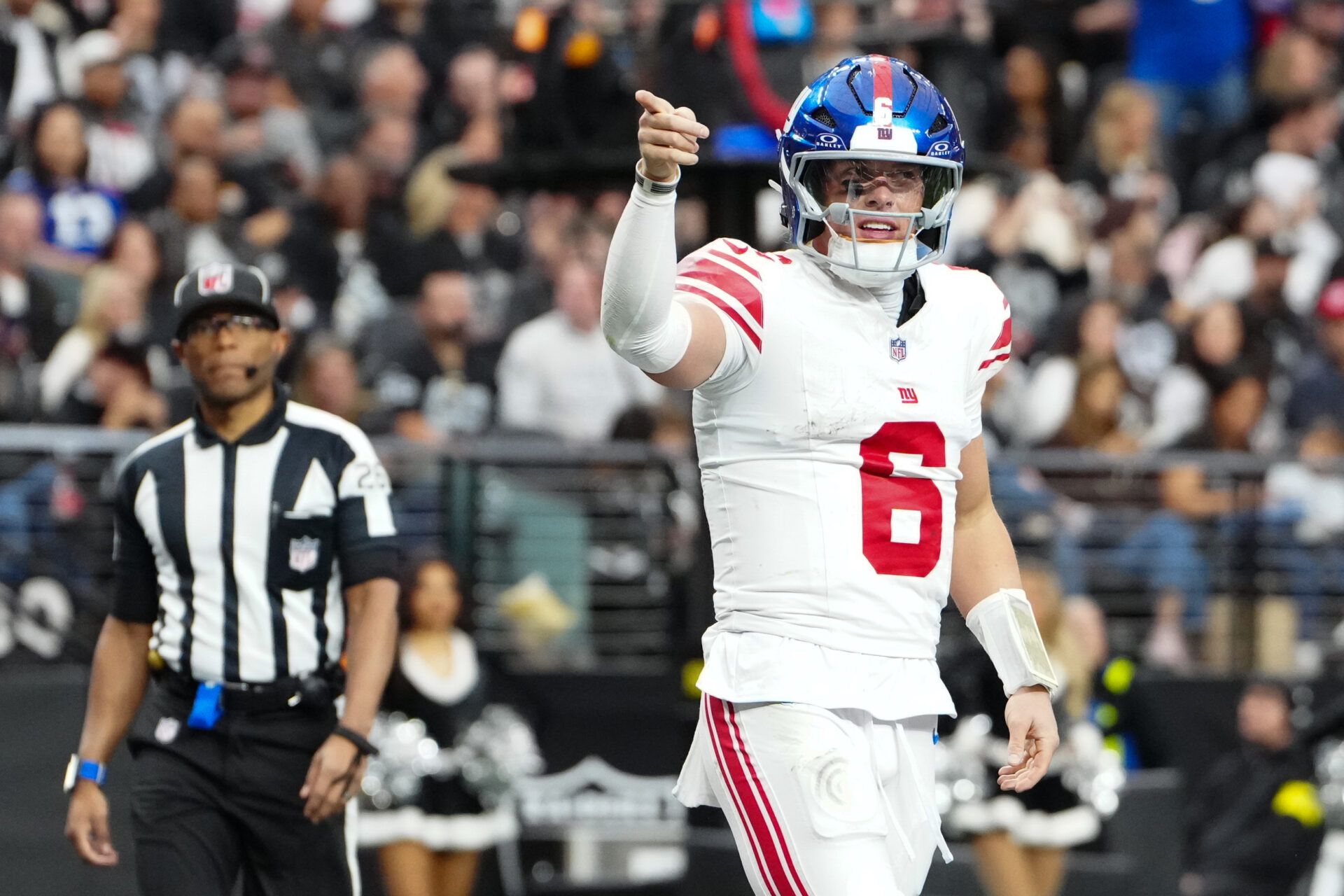 New York Giants quarterback Jaxson Dart (6) celebrates a touchdown in the second quarter against the Las Vegas Raiders at Allegiant Stadium.