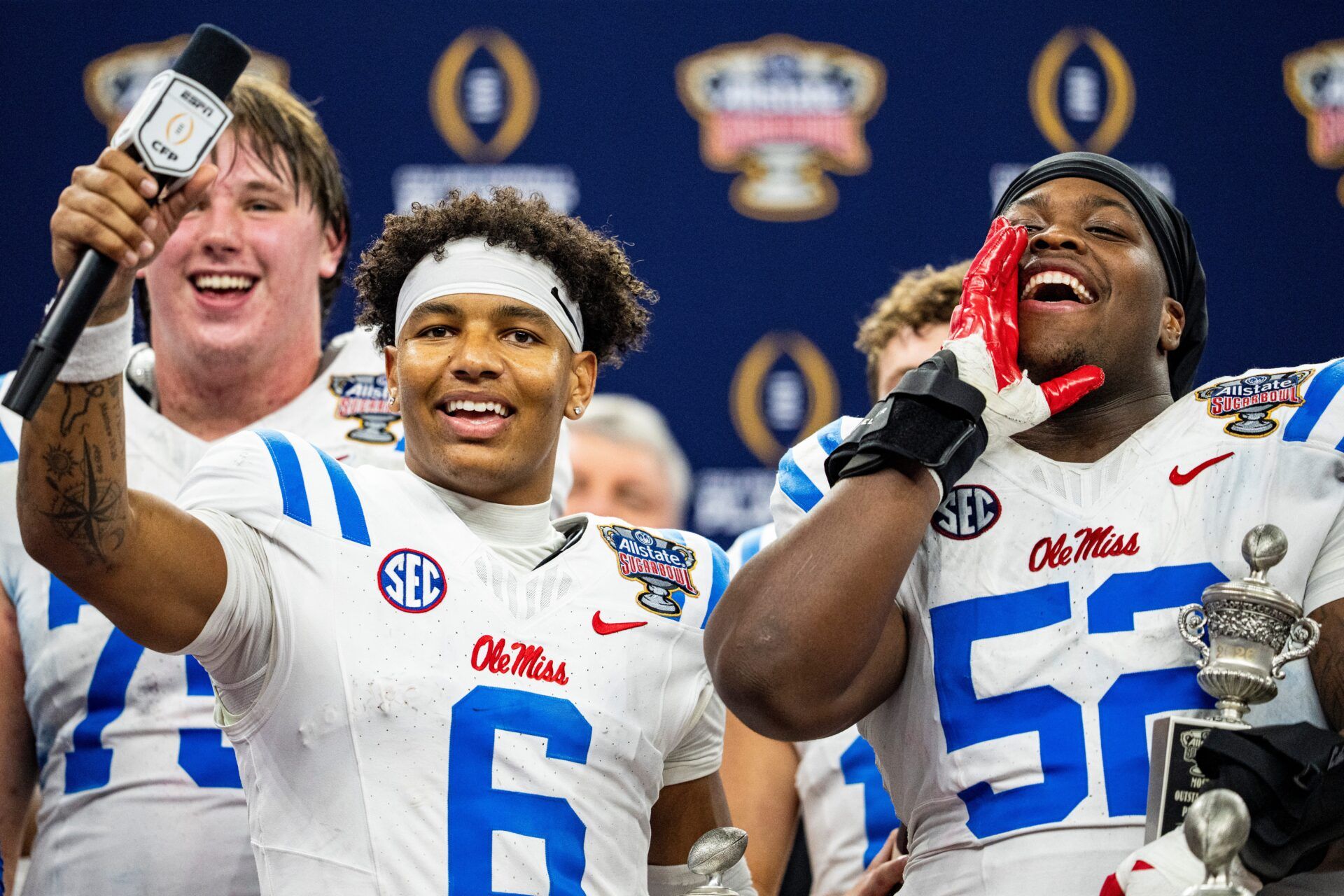 Ole Miss quarterback Trinidad Chambliss (6) and defensive lineman Will Echoles (52) interact with the fans after the Sugar Bowl and College Football Playoff quarterfinals at Caesars Superdome in New Orleans, La., on Thursday, Jan. 1, 2026. Ole Miss defeated Georgia 39-34. Chambliss and Echoles won most outstanding player for offense and defense respectively.