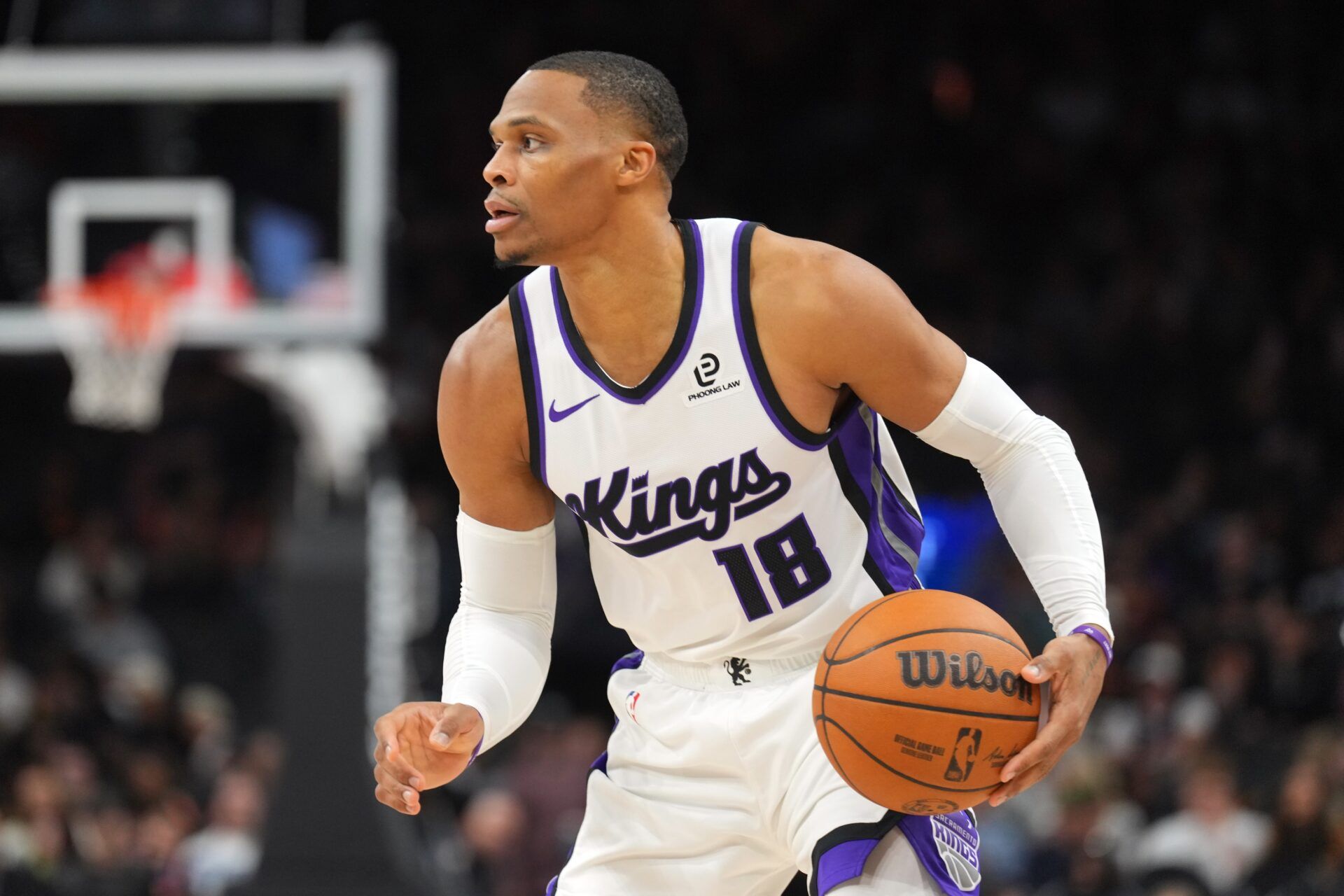 Sacramento Kings guard Russell Westbrook (18) dribbles the ball against the Phoenix Suns during the second half at Mortgage Matchup Center.