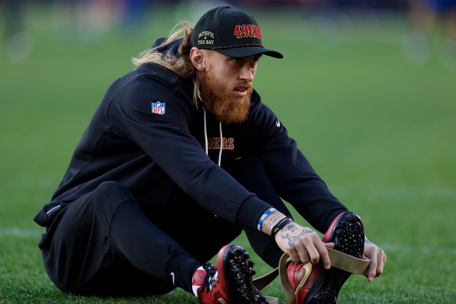 San Francisco 49ers tight end George Kittle (85) stretches before the game at Levi's Stadium.