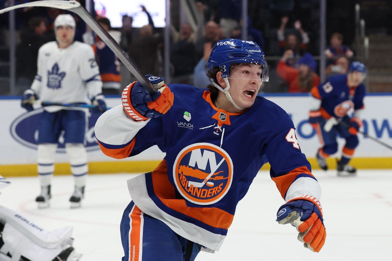 New York Islanders defenseman Matthew Schaefer (48) celebrates after scoring the winning goal in overtime against the Toronto Maple Leafs at UBS Arena.