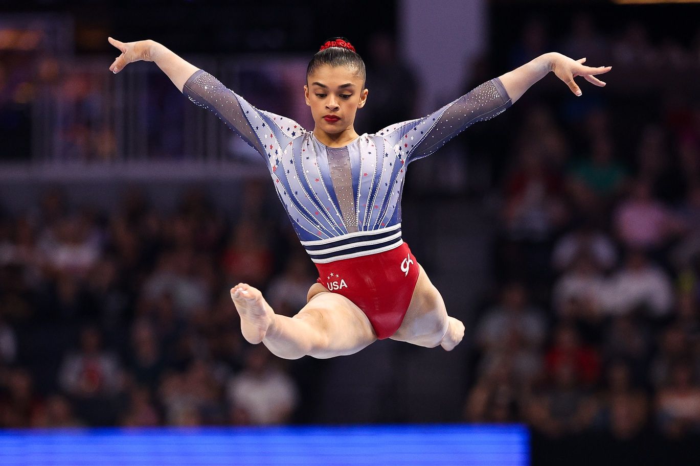 Tiana Sumanasekera competes on the beam during the U.S. Olympic Team Gymnastics Trials at Target Center.