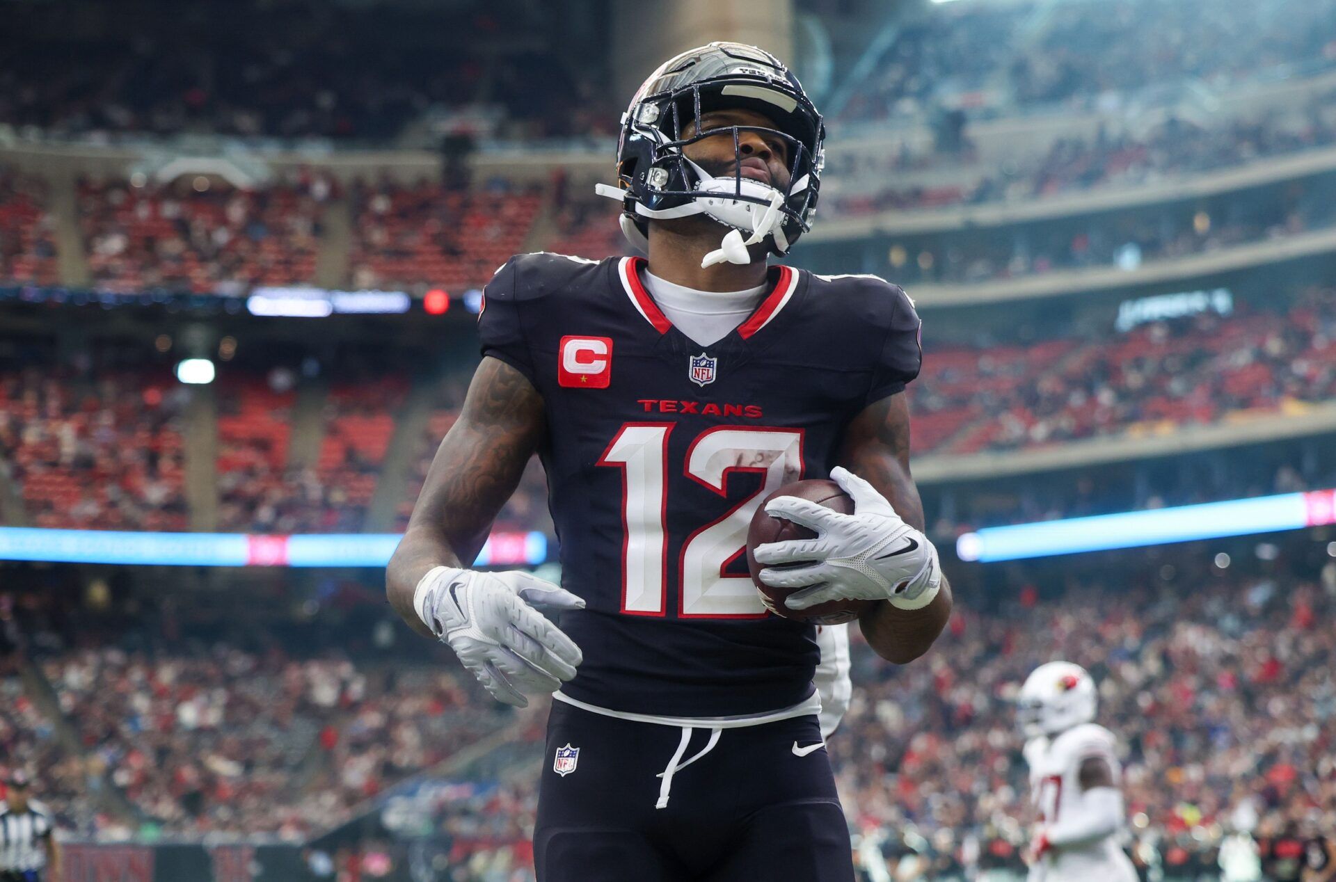 Houston Texans wide receiver Nico Collins (12) celebrates his touchdown against the Arizona Cardinals in the fourth quarter at NRG Stadium.