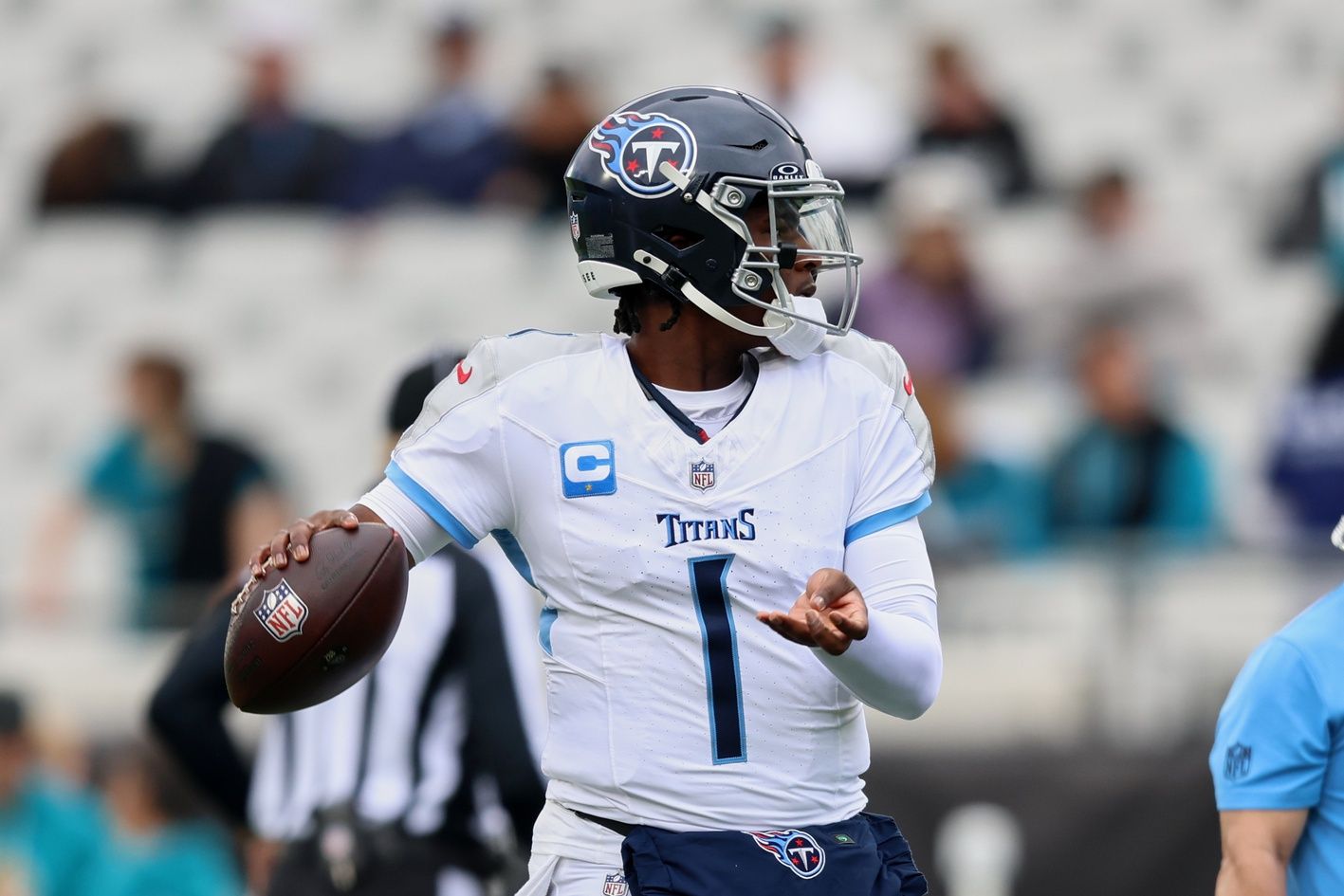 Tennessee Titans quarterback Cam Ward (1) throws a pass before the game against the Jacksonville Jaguars at EverBank Stadium.