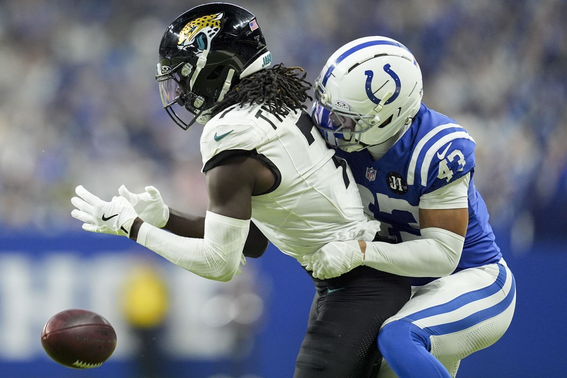 Indianapolis Colts cornerback Cameron Mitchell (43) breaks up a pass intended for Jacksonville Jaguars wide receiver Brian Thomas Jr. (7) during a game  at Lucas Oil Stadium.