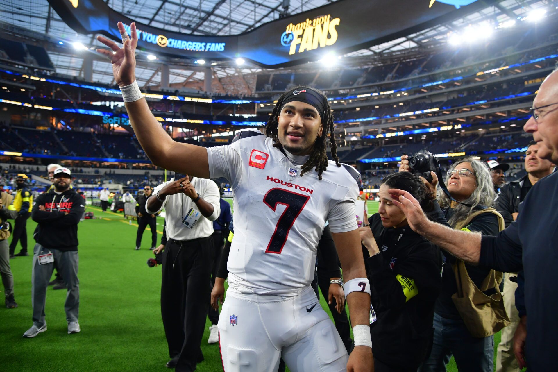Houston Texans quarterback C.J. Stroud (7) waves to fans following a game against the Los Angeles Chargers at SoFi Stadium.