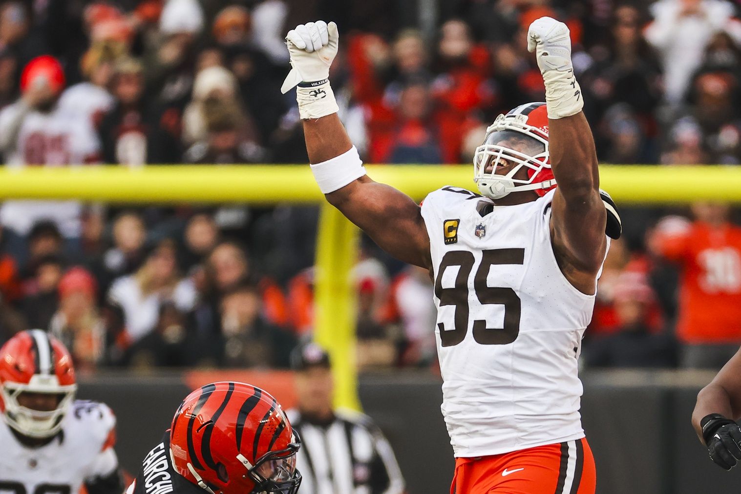 Cleveland Browns defensive end Myles Garrett (95) celebrates following a sack against the Cincinnati Bengals during the fourth quarter at Paycor Stadium. The play set a new NFL single season sack record by Garrett.