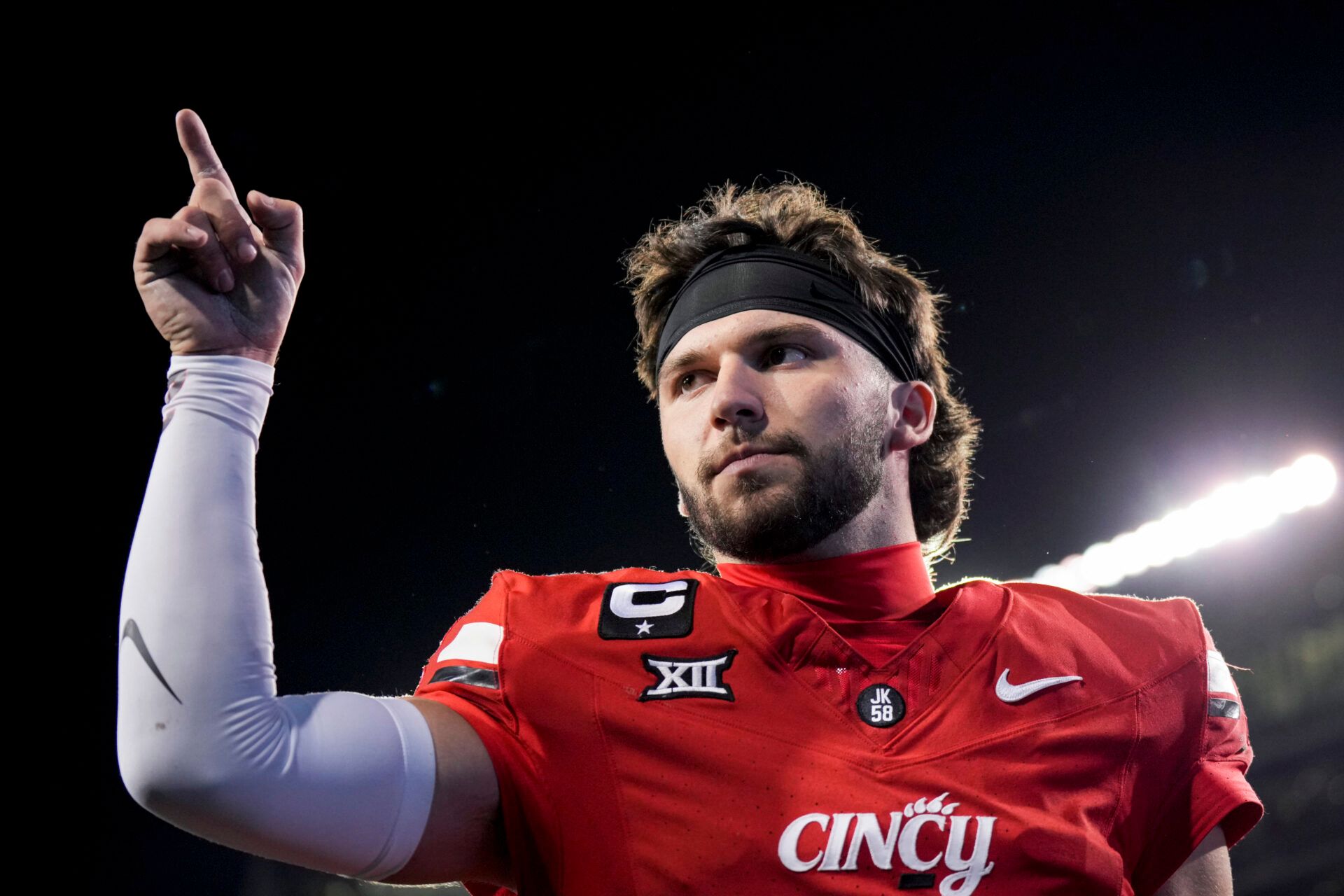Cincinnati Bearcats quarterback Brendan Sorsby points to fans as he walks off the field after defeating the Baylor Bears at Nippert Stadium.