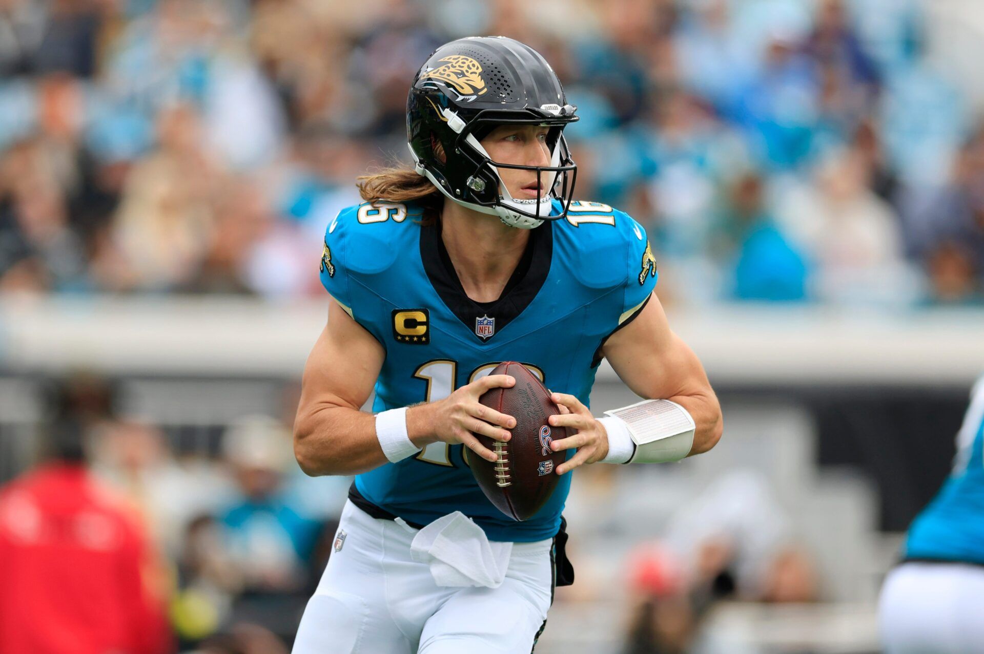 (EDITOR’S NOTE: Resubmitted with alternate crop.) Jacksonville Jaguars quarterback Trevor Lawrence (16) looks to throw during the second quarter of an NFL football matchup at EverBank Stadium, Sunday, Jan. 4, 2026, in Jacksonville, Fla. The Jaguars defeated the Titans 41-7, capturing the AFC North title. [Corey Perrine/Florida Times-Union]