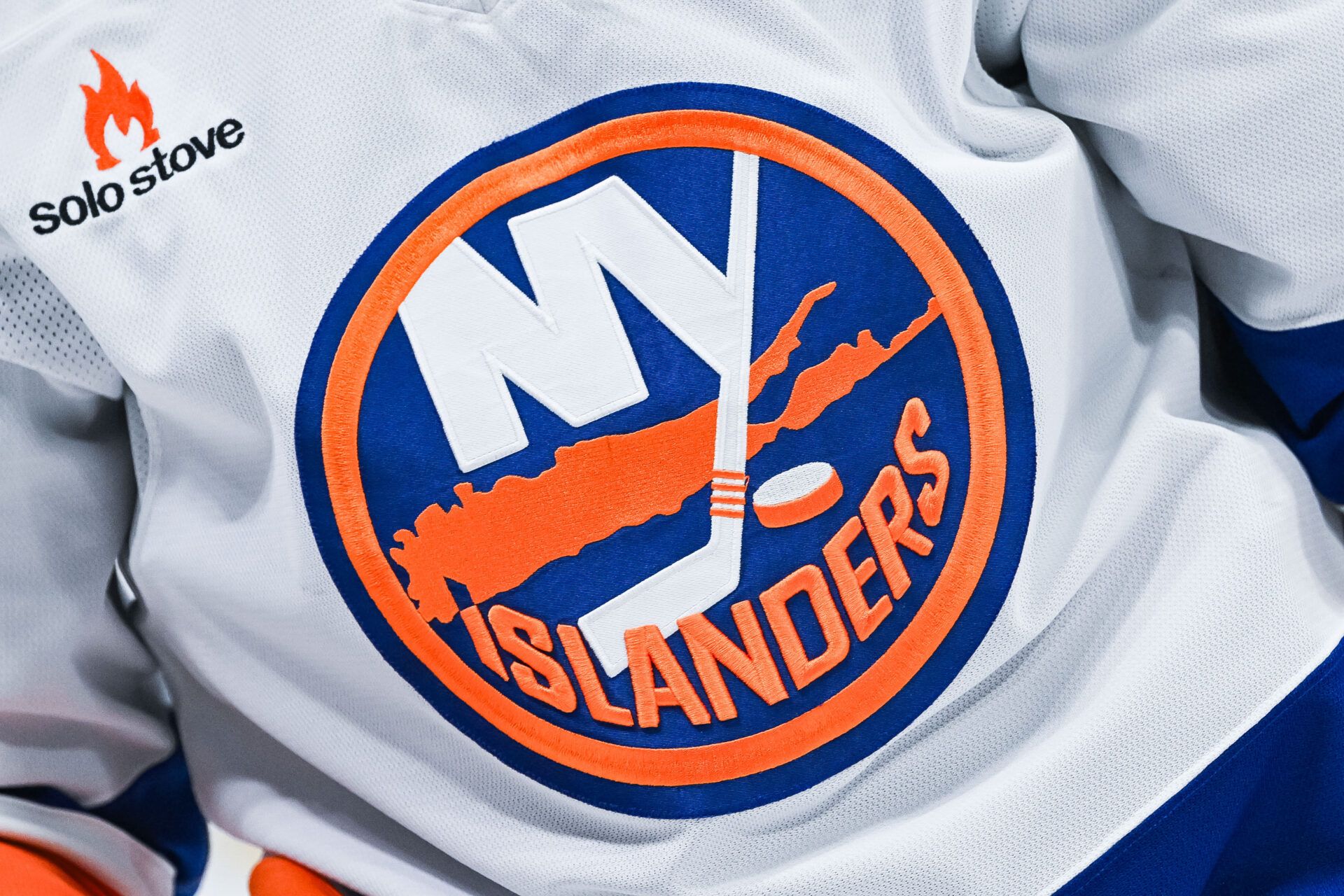 View of a New York Islanders logo on a jersey worn by a member of the team during warm-up before the game at Bell Centre.