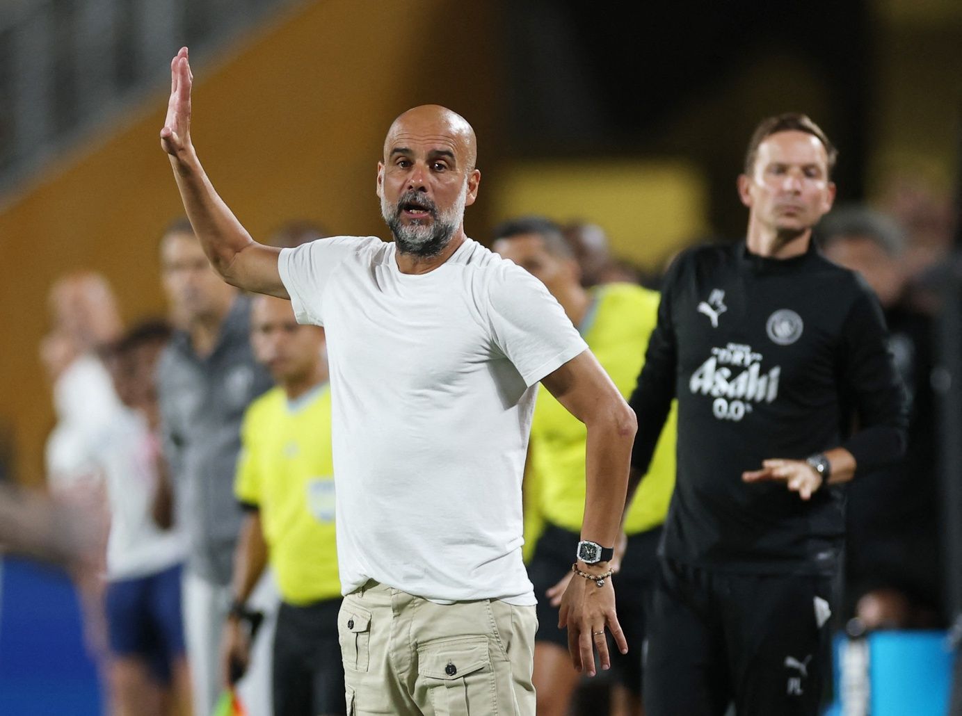[Subscription Customers Only] Jun 30, 2025; Orlando, Florida, USA; Manchester City manager Pep Guardiola reacts during a round of 16 match of the 2025 FIFA Club World Cup at Camping World Stadium.