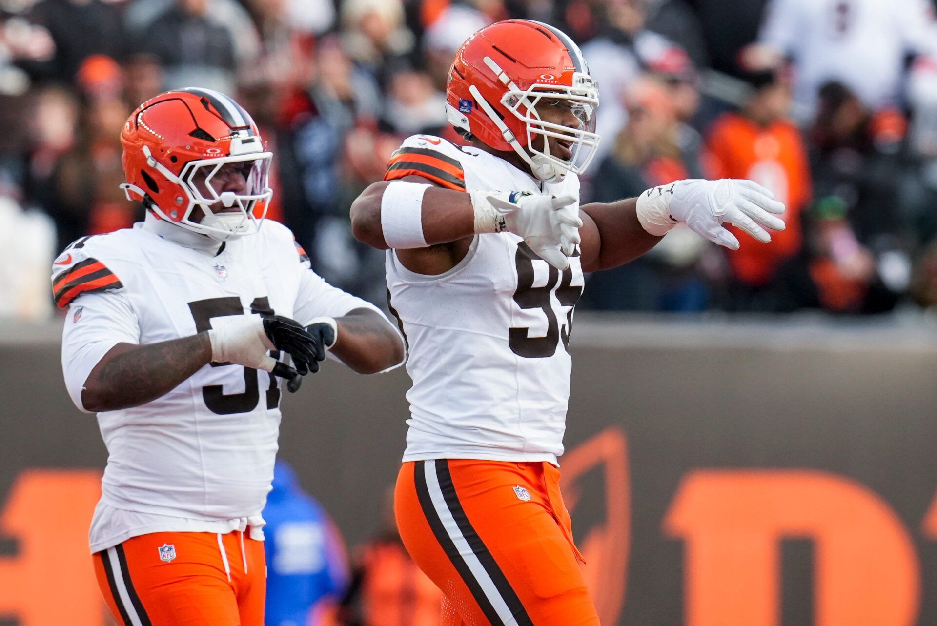Cleveland Browns defensive end Myles Garrett (95) celebrates as he comes back on the field in the fourth quarter of the NFL Week 18 game between the Cincinnati Bengals and the Cleveland Browns at Paycor Stadium in Downtown Cincinnati on Sunday, Jan. 4, 2026. The Browns kicked a last second field goal to win 20-18.