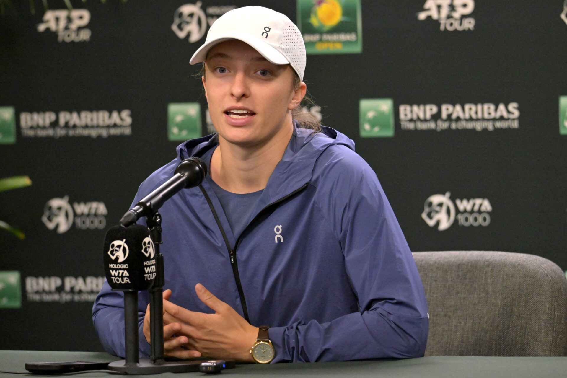 Iga Swiatek (POL) answers questions from the media during a press conference during the BNP Paribas Open at the Indian Wells Tennis Garden.
