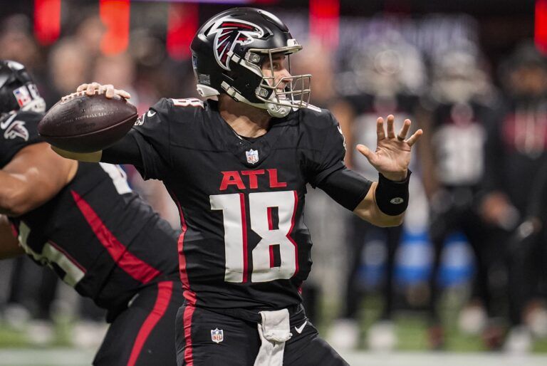 Atlanta Falcons quarterback Kirk Cousins (18) passes the ball against the New Orleans Saints during the second half at Mercedes-Benz Stadium.