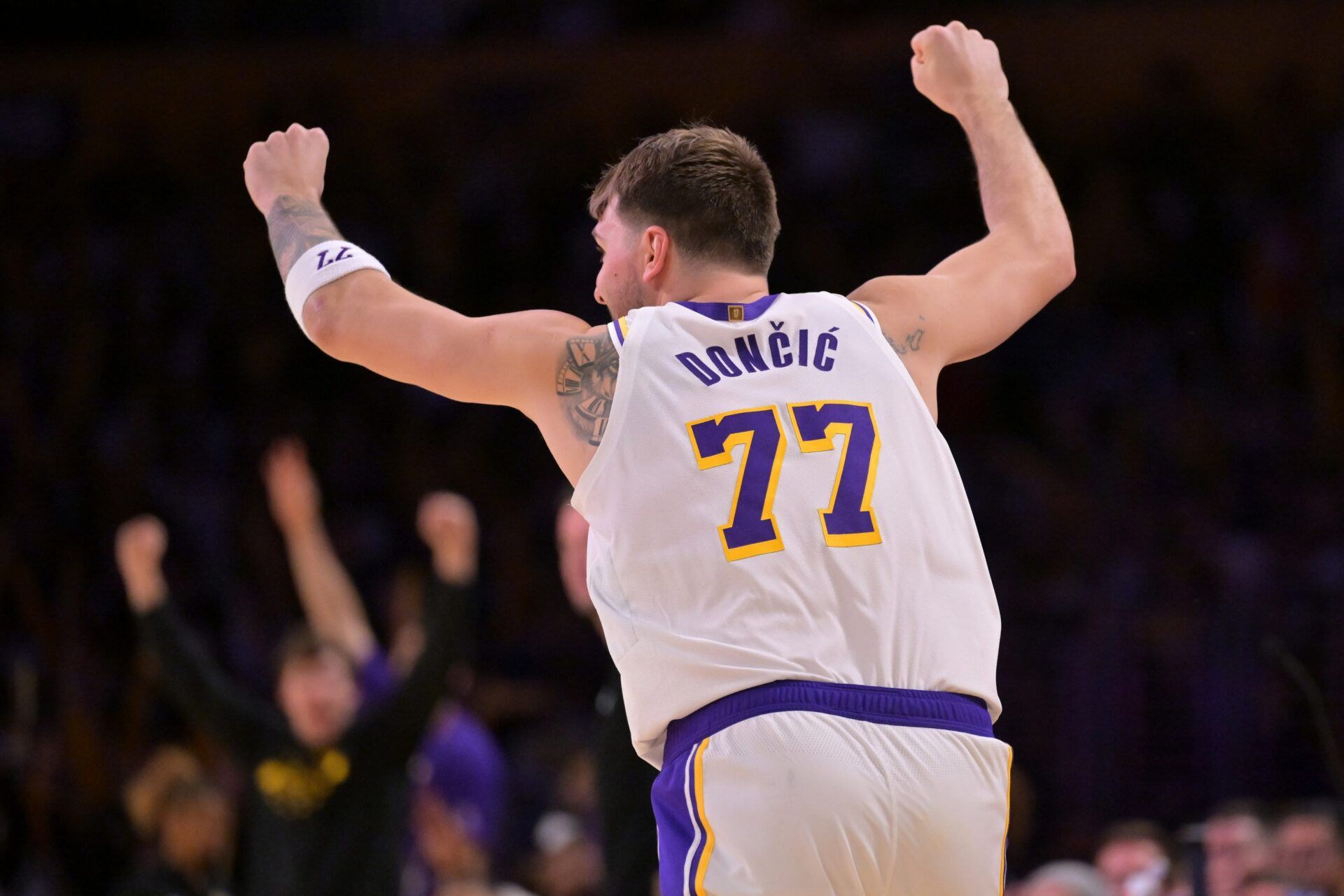 Los Angeles Lakers guard Luka Doncic (77) reacts after a 3-point basket in the second half against the Sacramento Kings at Crypto.com Arena.