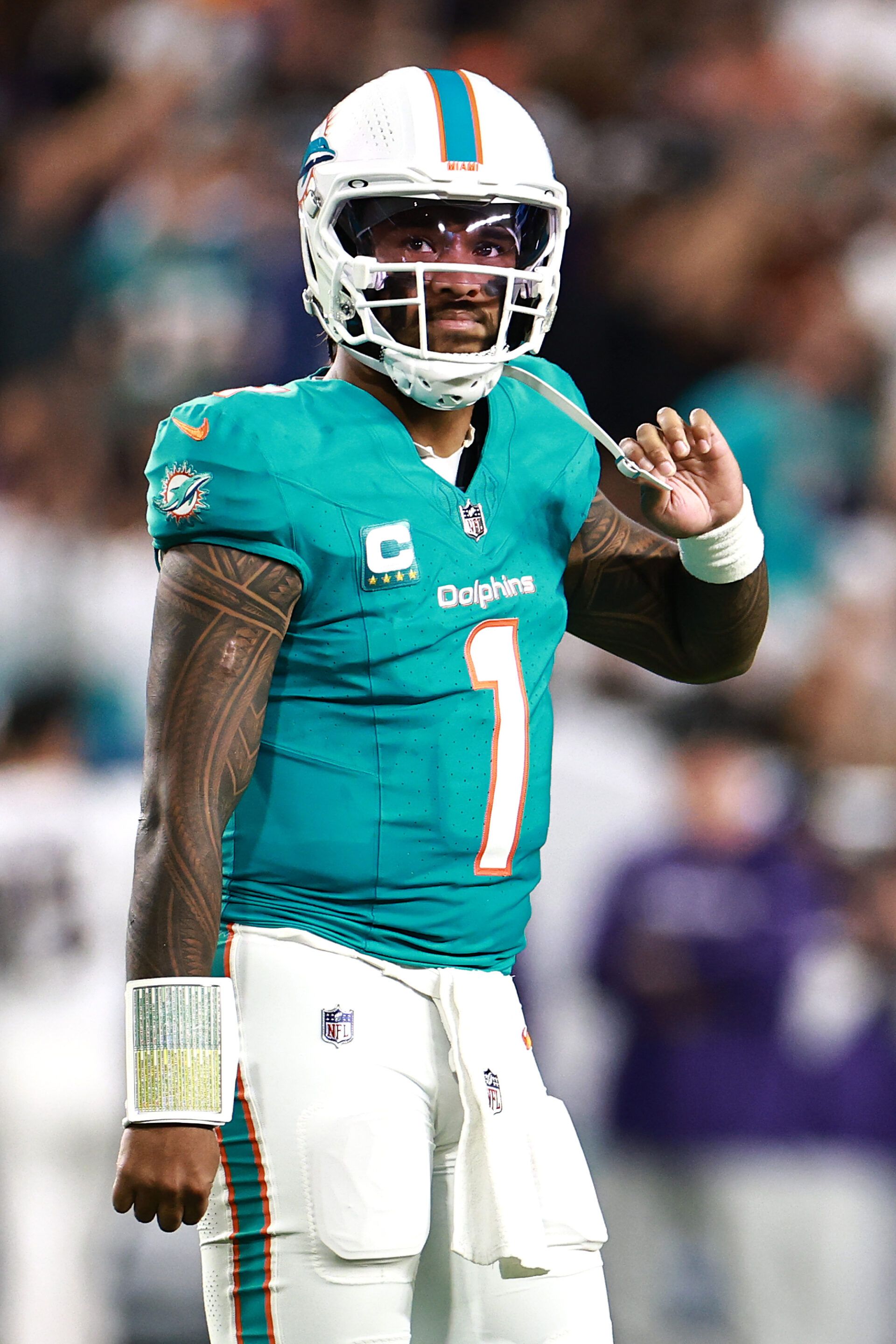 MIAMI GARDENS, FLORIDA - OCTOBER 30: Tua Tagovailoa #1 of the Miami Dolphins reacts against the Baltimore Ravens during the second quarter in the game at Hard Rock Stadium on October 30, 2025 in Miami Gardens, Florida. (Photo by Carmen Mandato/Getty Images)