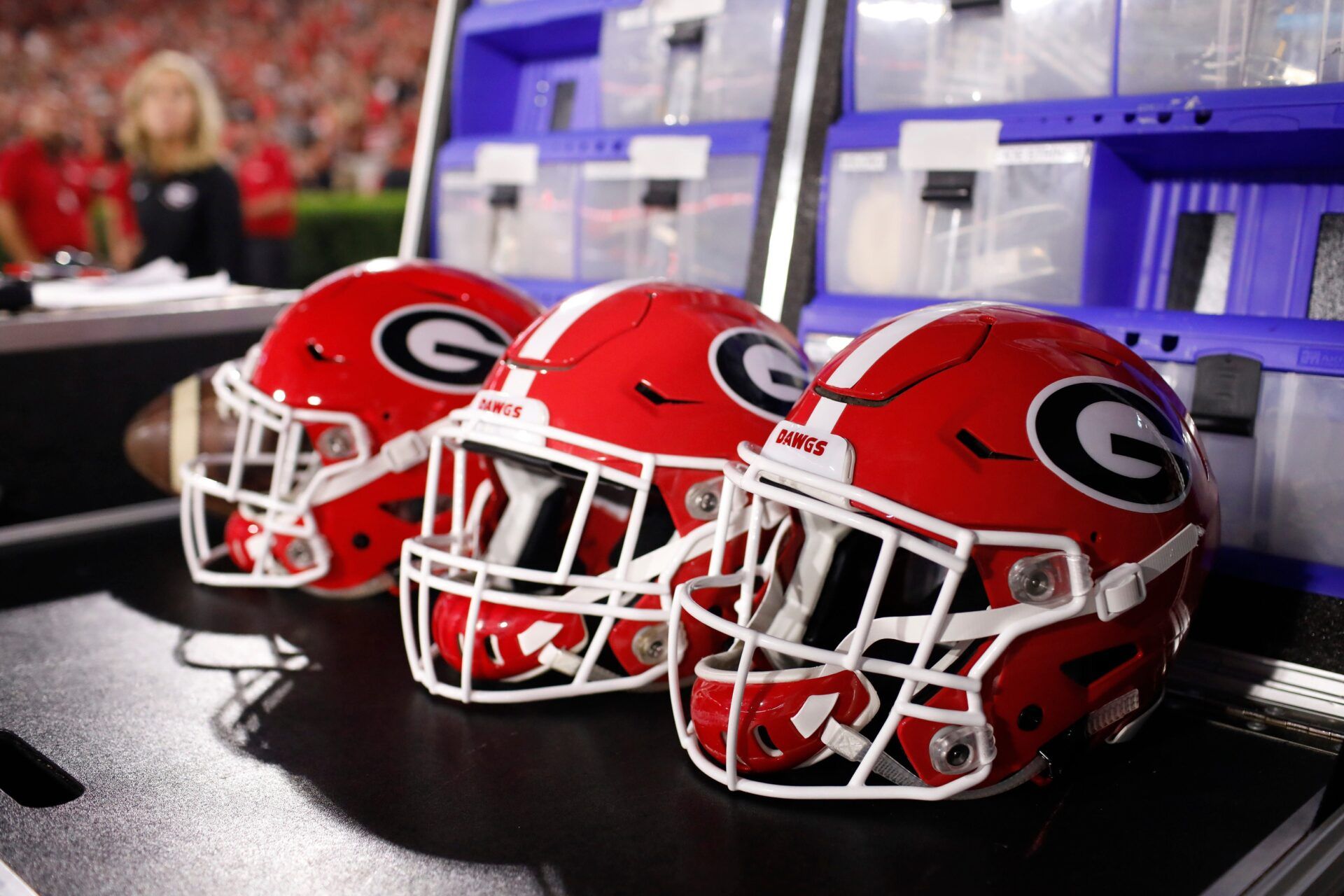 UGA Bulldogs football helmets sit in a row before a game.

News Joshua L Jones