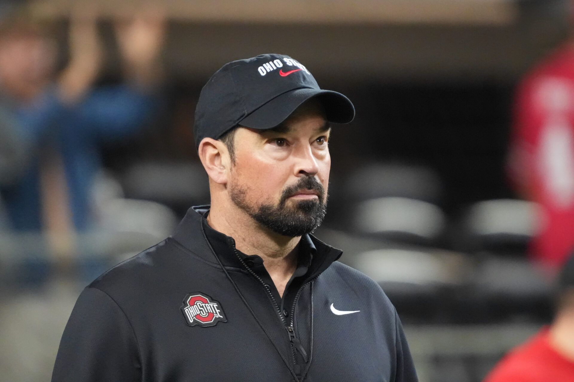 Ohio State Buckeyes head coach Ryan Day looks on during warm ups before the 2025 Cotton Bowl and quarterfinal game of the College Football Playoff at AT&T Stadium.
