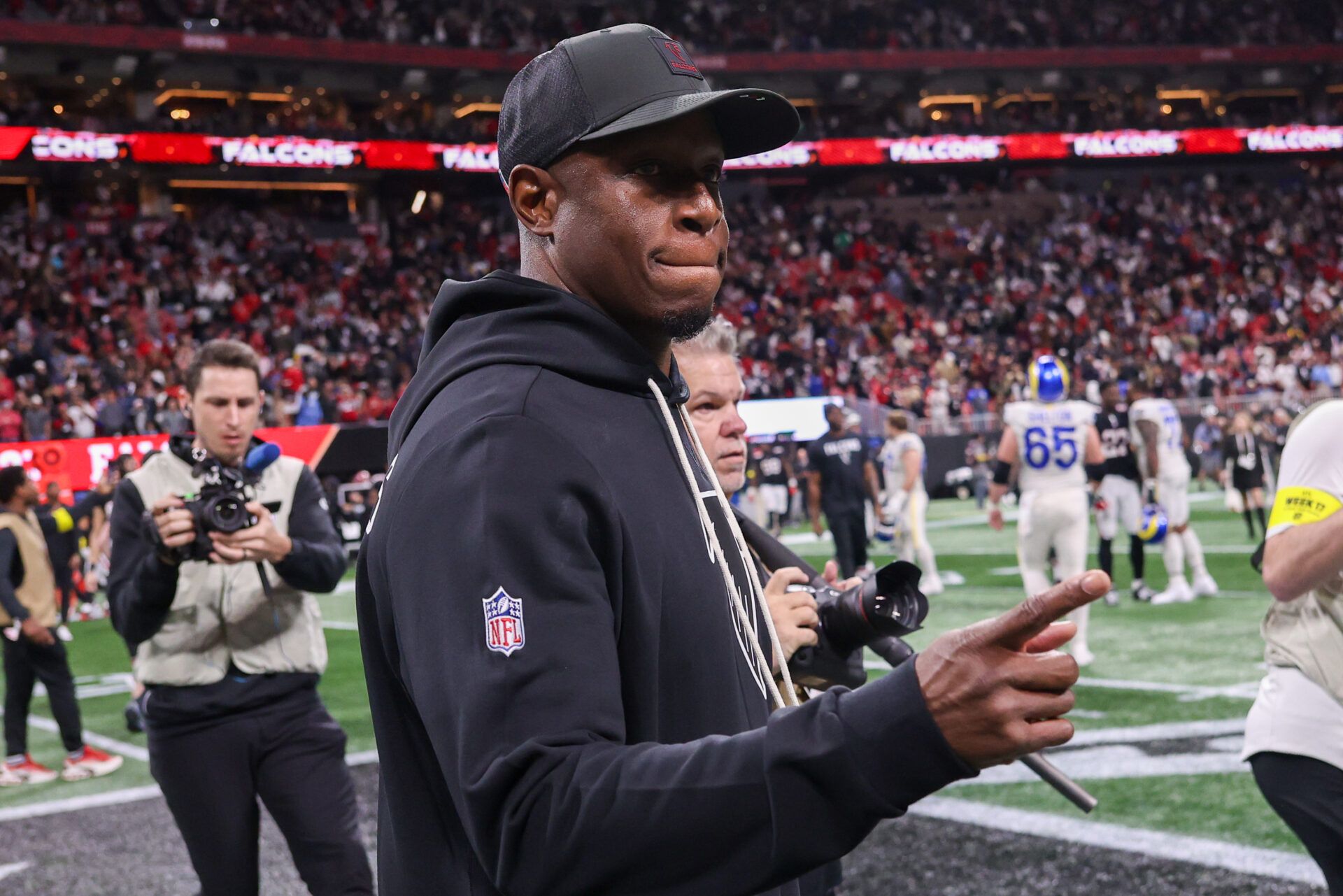 Atlanta Falcons head coach Raheem Morris celebrates after a victory over the Los Angeles Rams at Mercedes-Benz Stadium.