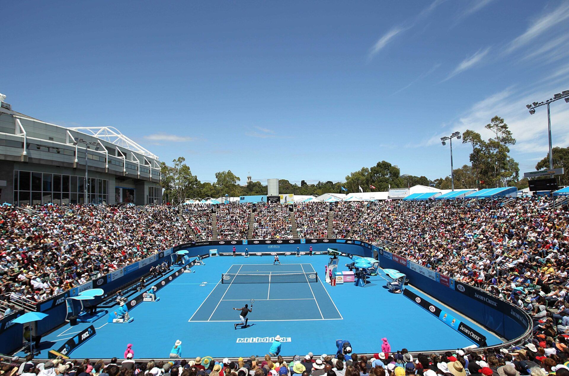 A general view as Gael Monfils (FRA) returns a shot against Matthew Ebden (AUS) on day two of the 2010 Australian Open in Melbourne Park.  Monfils won 6-4, 6-4, 6-4.