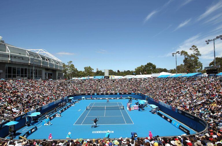 A general view as Gael Monfils (FRA) returns a shot against Matthew Ebden (AUS) on day two of the 2010 Australian Open in Melbourne Park.  Monfils won 6-4, 6-4, 6-4.