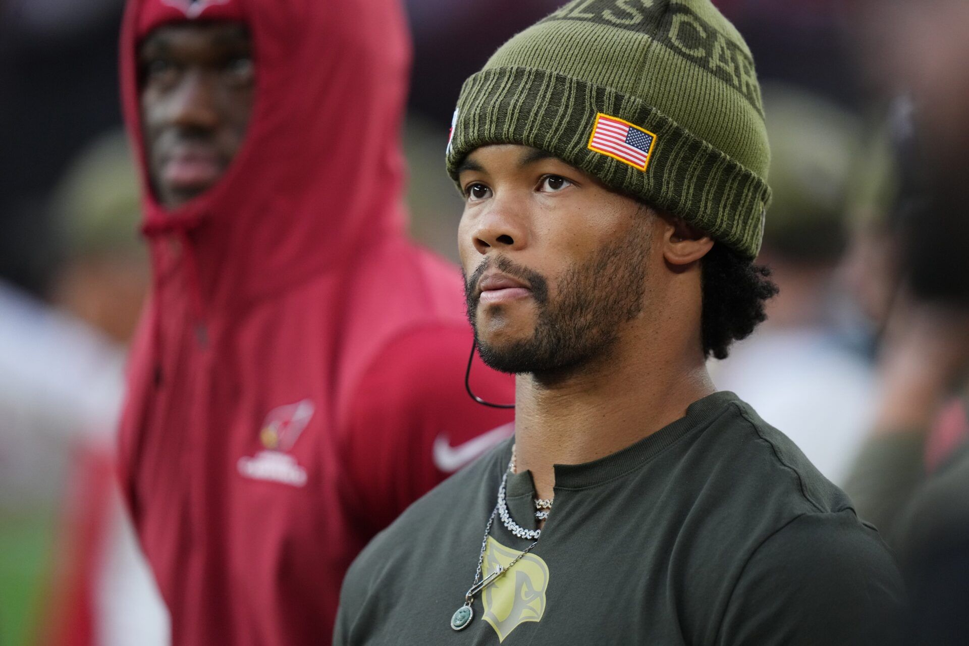 Arizona Cardinals quarterback Kyler Murray watches his team from the sidelines as they play the San Francisco 49ers at State Farm Stadium in Glendale on Nov. 16, 2025.