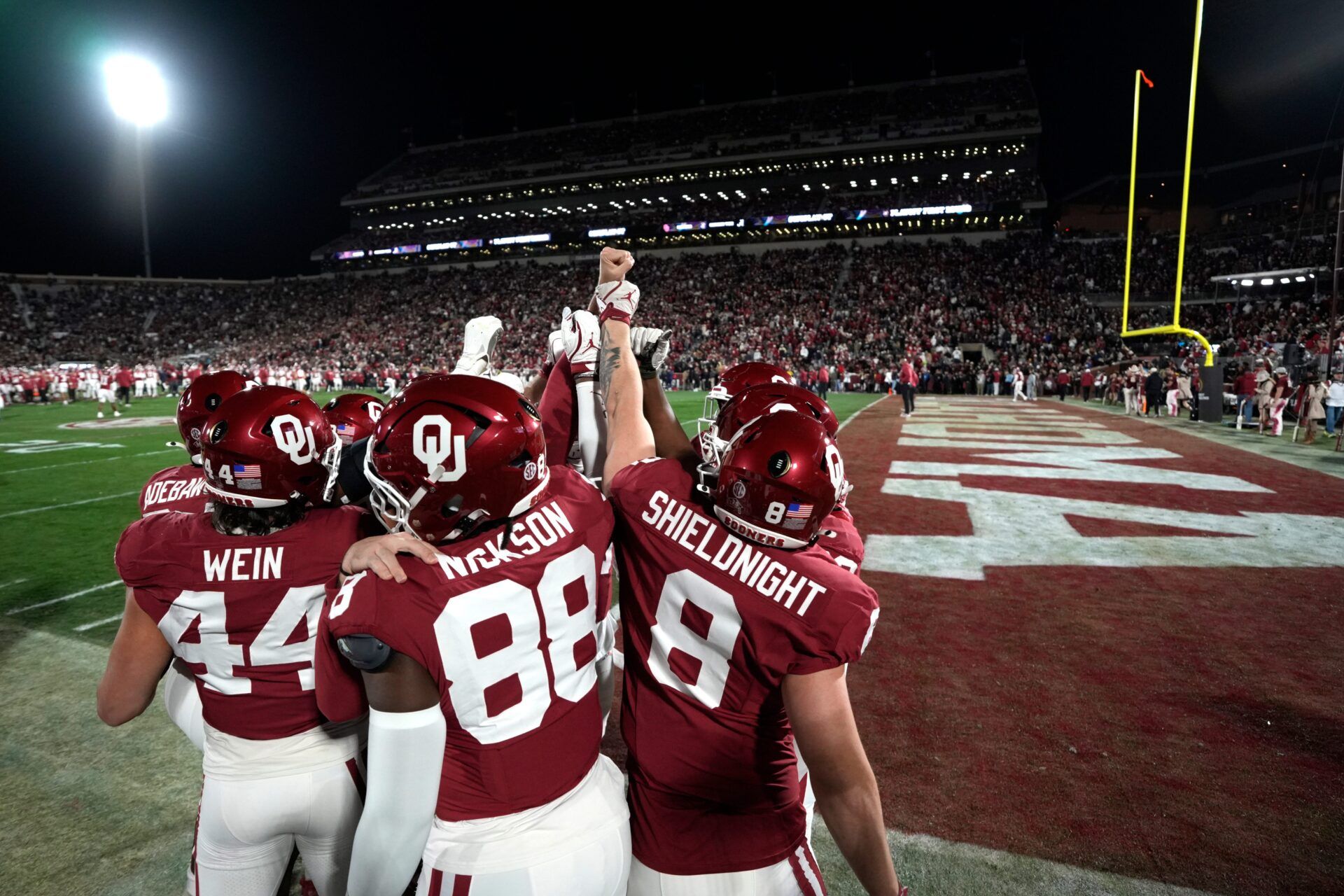 Oklahoma players gather before a first-round College Football Playoff game between the University of Oklahoma Sooners (OU) and the Alabama Crimson Tide at Gaylord Family - Oklahoma Memorial Stadium in Norman, Okla., Friday, Dec. 19, 2025. Alabama won 34-24.