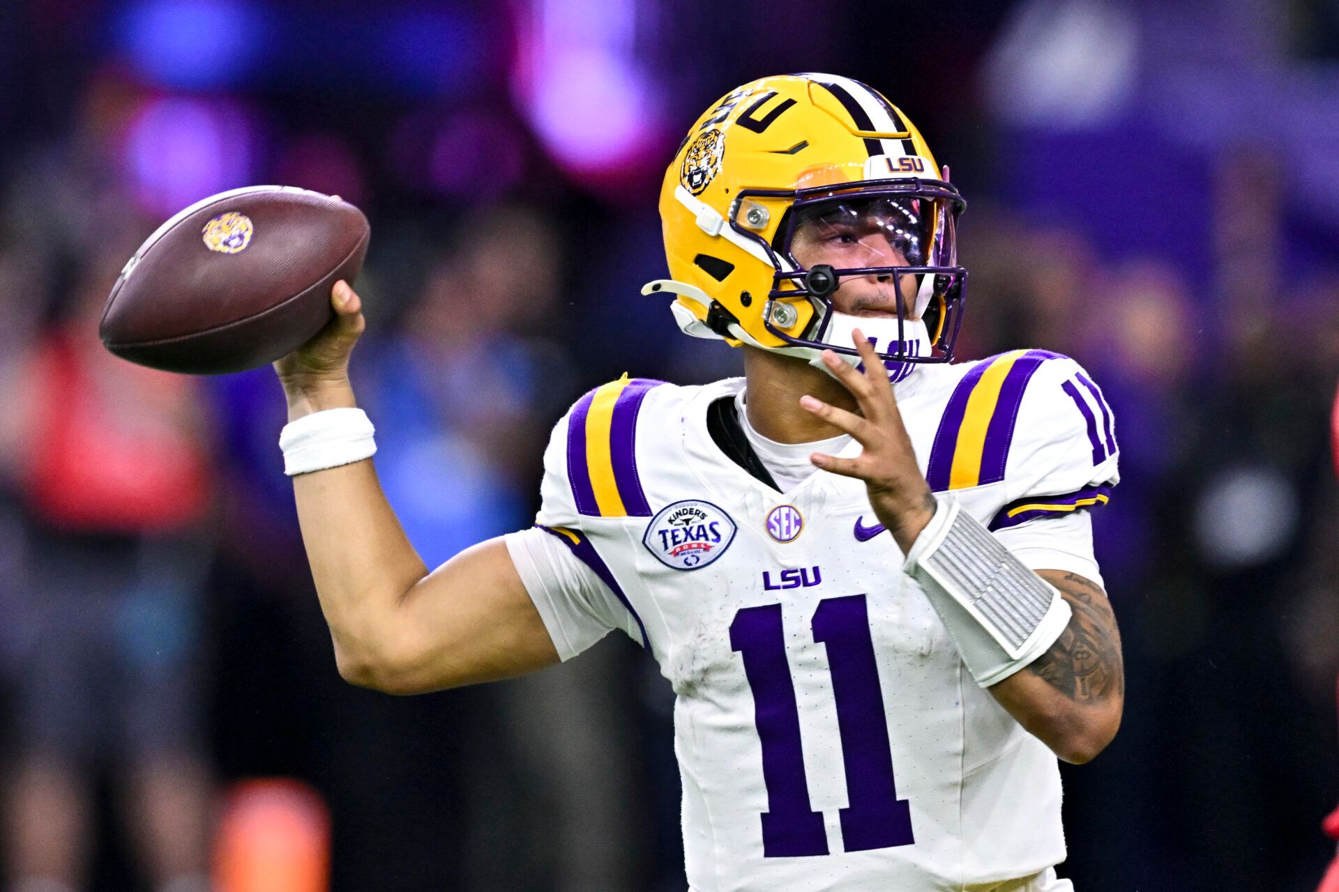 Louisiana State Tigers quarterback Michael van Buren Jr. (11) throws a pass during the second half against the Houston Cougars at NRG Stadium.