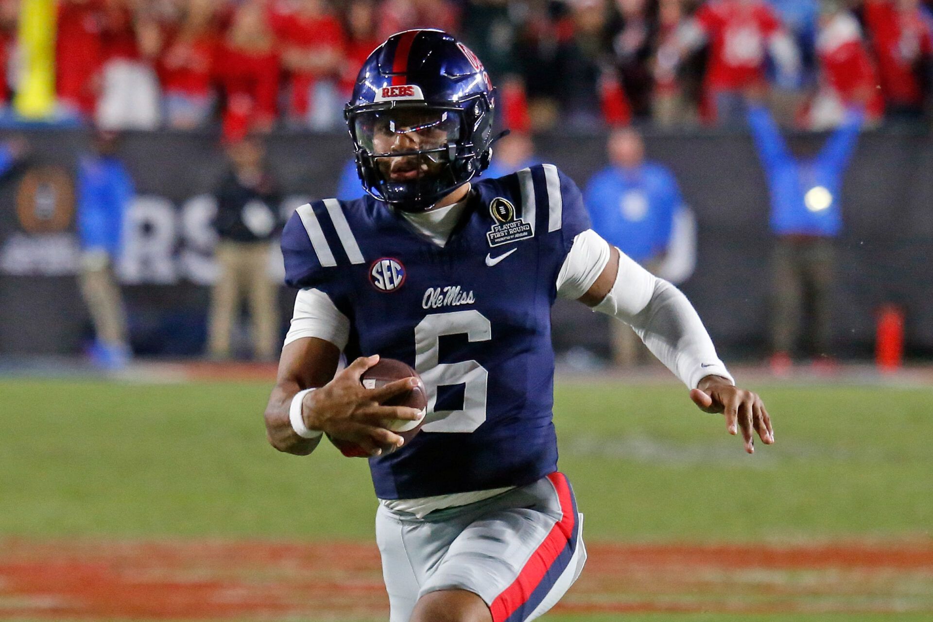 Mississippi Rebels quarterback Trinidad Chambliss (6) runs the ball during the fourth quarter against the Tulane Green Wave at Vaught-Hemingway Stadium.
