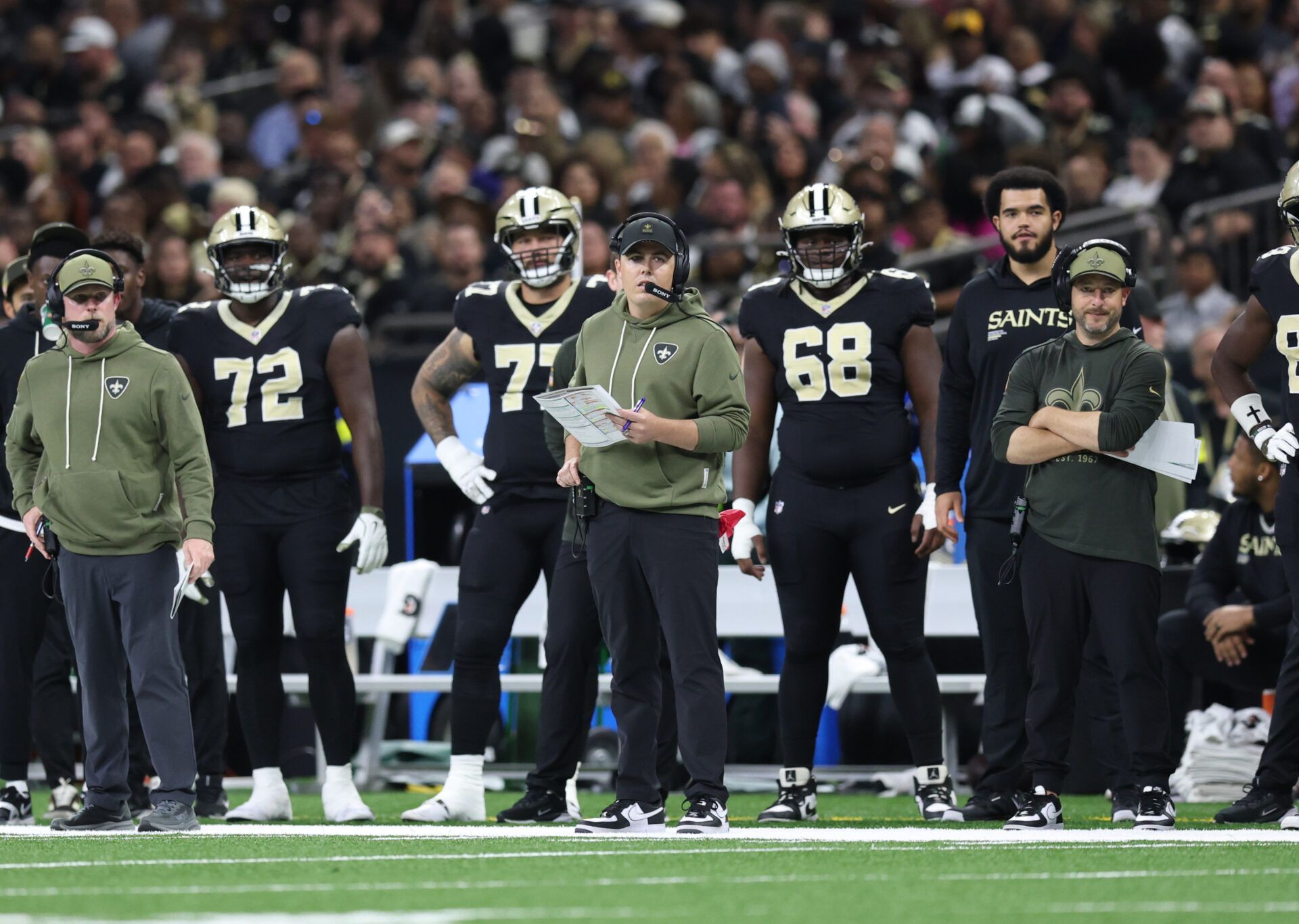 New Orleans Saints head coach Kellen Moore stands on the sidelines during the second quarter against the Tampa Bay Buccaneers at Caesars Superdome.