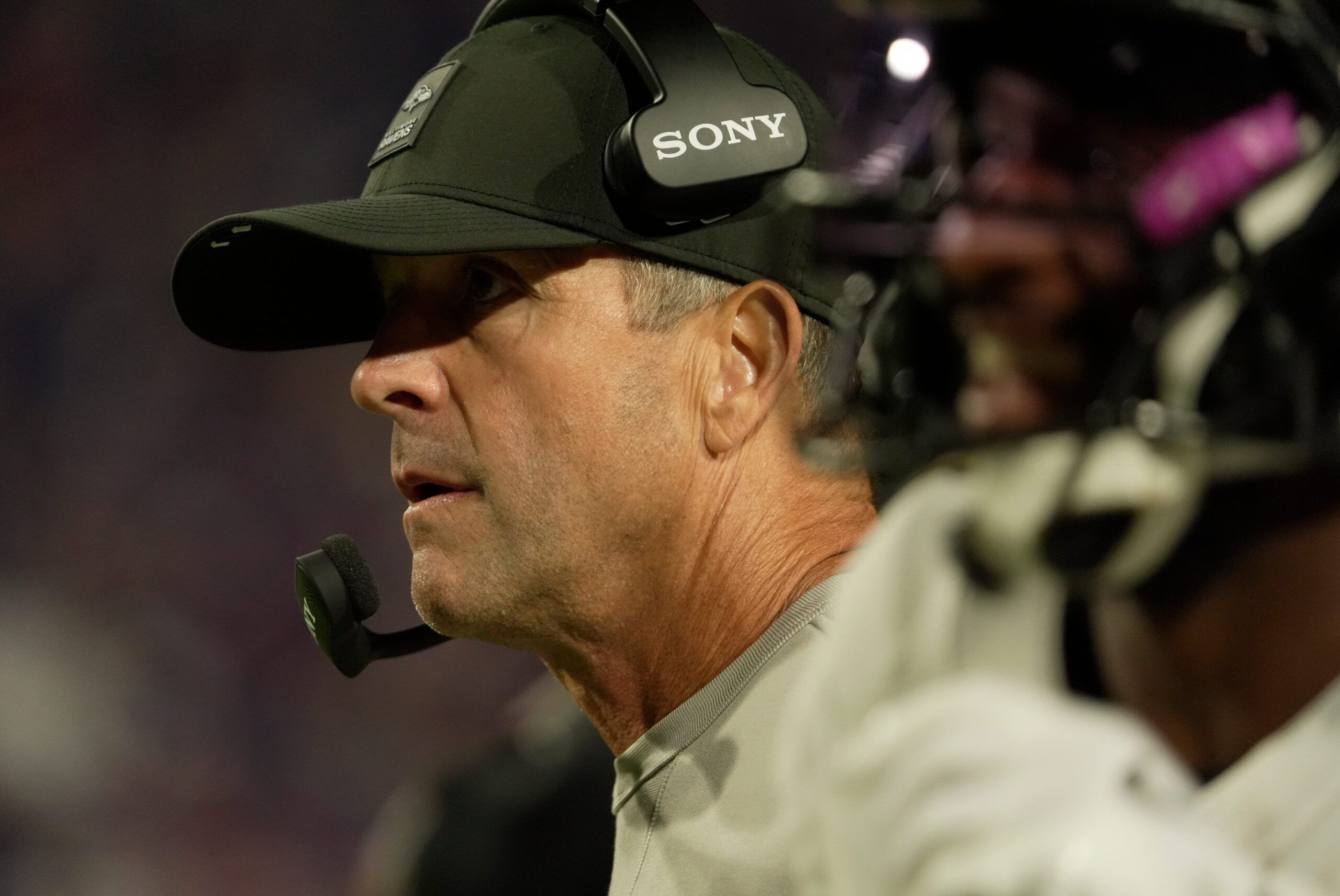 Baltimore Ravens head coach John Harbaugh watches the offense on the field during first half action against the Baltimore Ravens at Highmark Stadium in Orchard Park on Sept. 7, 2025.
