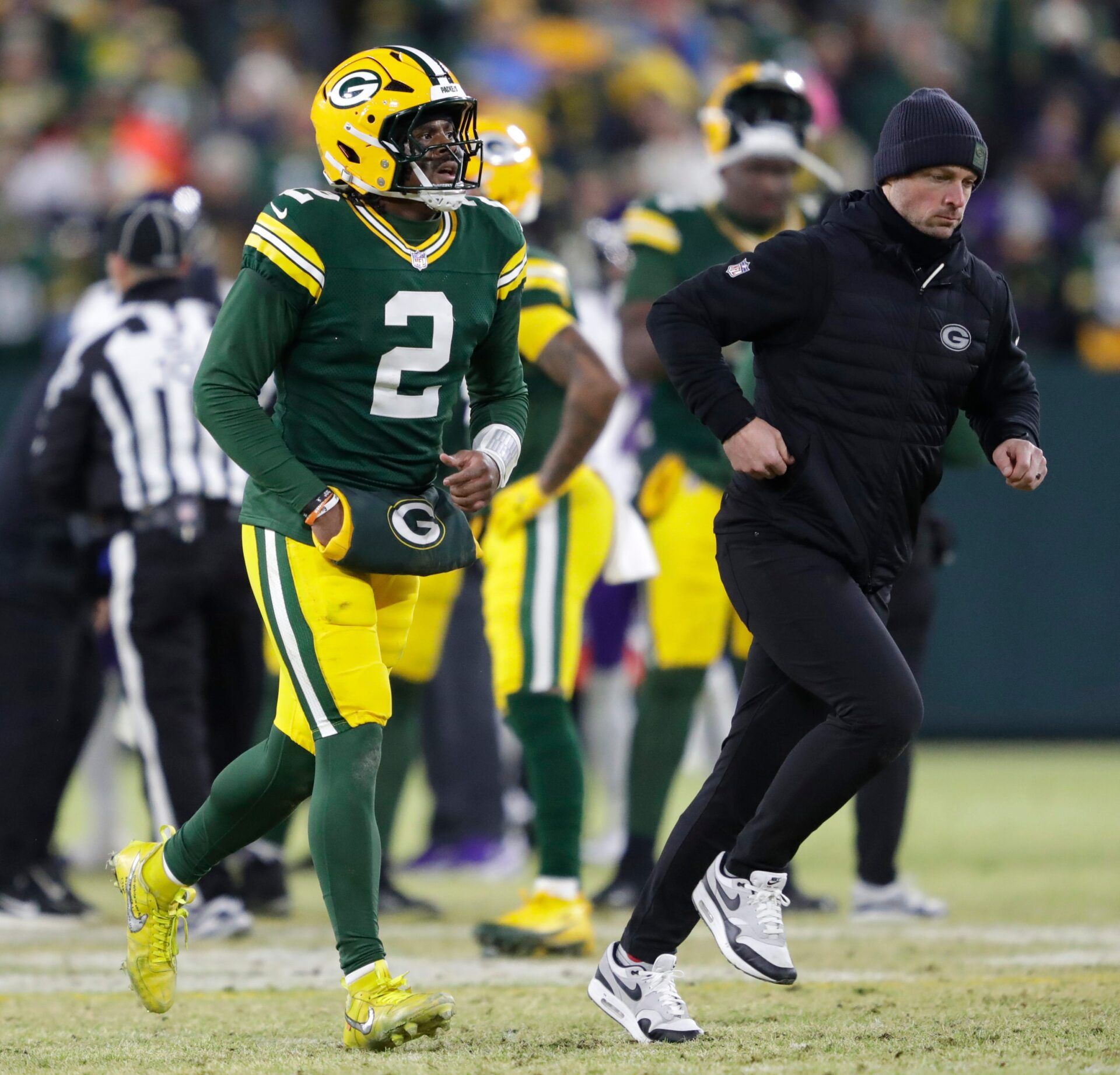 Green Bay Packers quarterback Malik Willis (2) leaves the field after getting injured against the Baltimore Ravens in the fourth quarter during their football game Saturday, December 27, 2025, at Lambeau Field in Green Bay, Wisconsin. Willis left the field under his own power and returned later in the quarter but did not play.