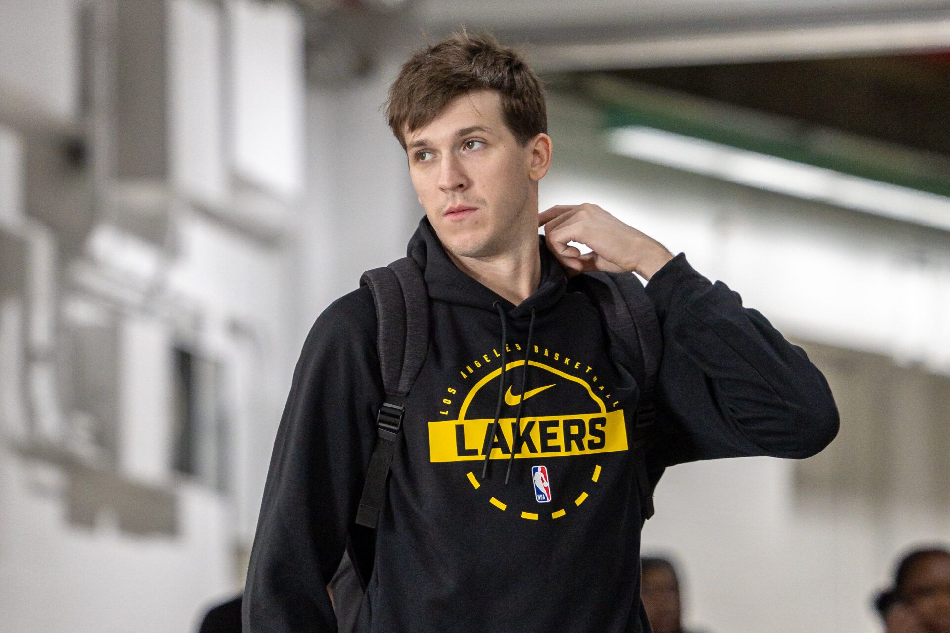 Los Angeles Lakers guard Austin Reaves (15) arrives at the arena before the game against the New Orleans Pelicans at Smoothie King Center.