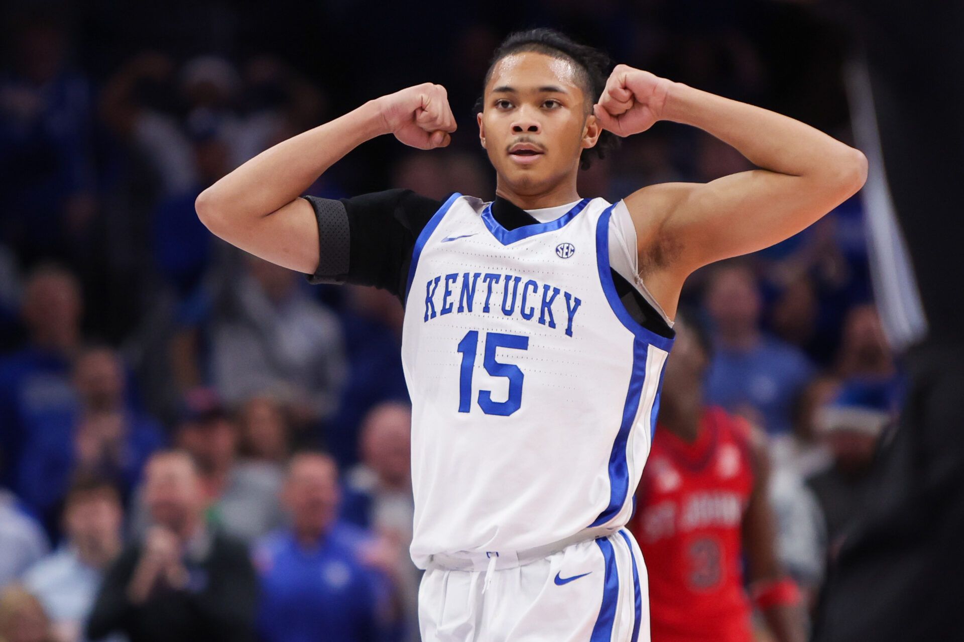 Kentucky Wildcats guard Jaland Lowe (15) reacts after a basket against the St. John Red Storm in the second half at State Farm Arena.