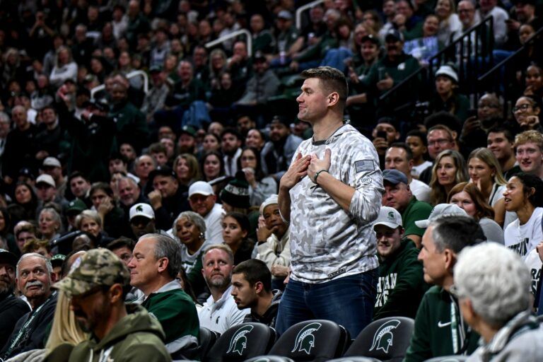 A Michigan State fan, former Spartan great Paul Davis, gestures as he is ejected from Michigan State's game against USC during the second half on Monday, Jan. 5, 2026, at the Breslin Center in East Lansing.