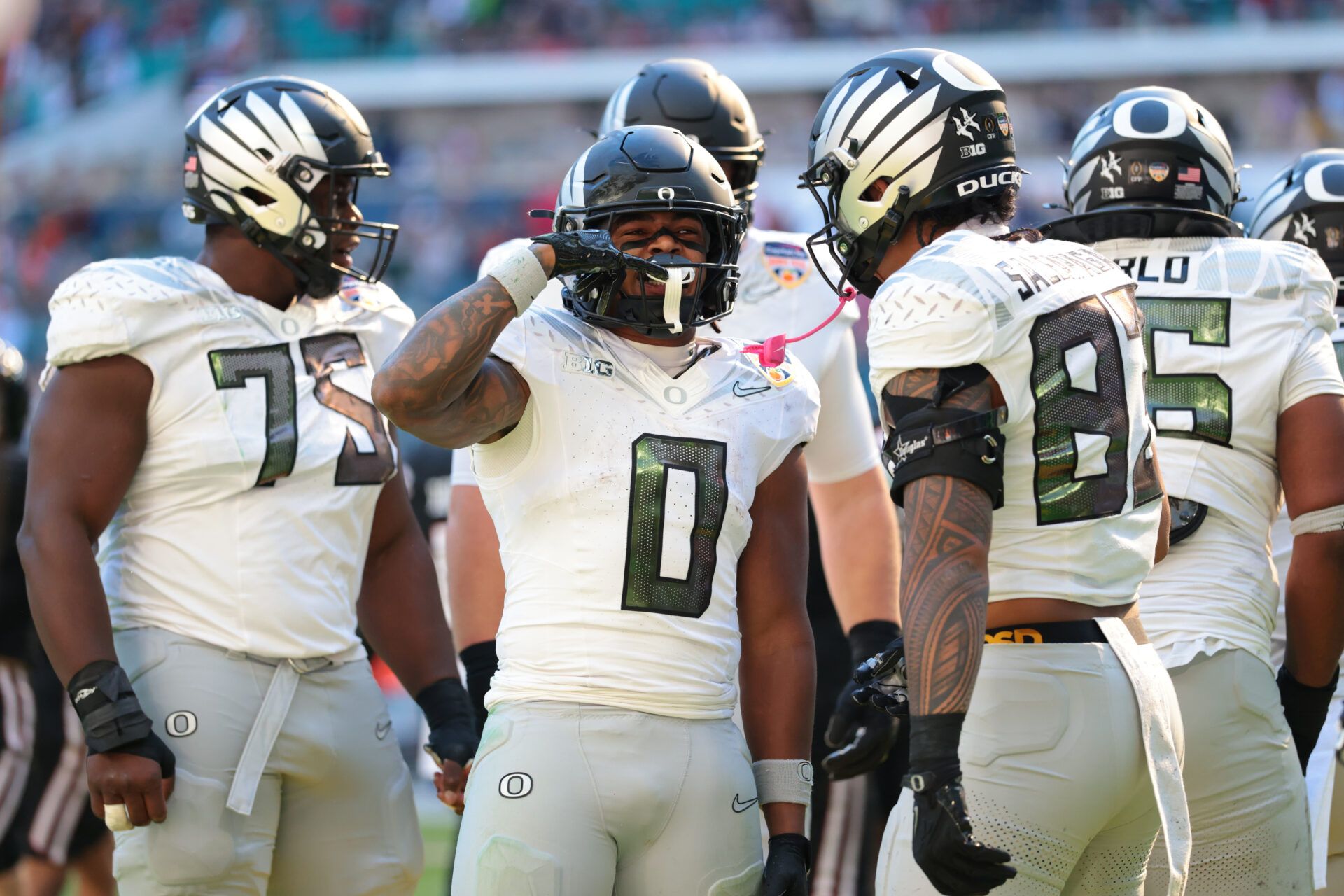 Oregon Ducks running back Jordon Davison (0) reacts after scoring a touchdown against the Texas Tech Red Raiders during the second half of the 2025 Orange Bowl and quarterfinal game of the College Football Playoff at Hard Rock Stadium.