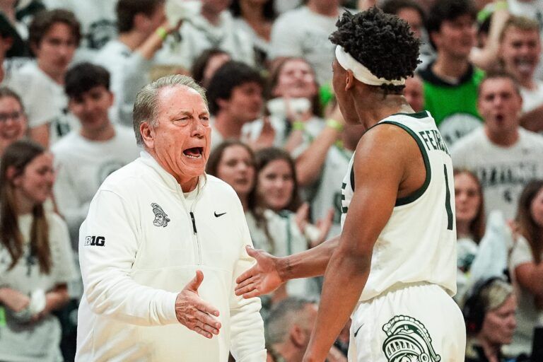 Michigan State head coach Tom Izzo celebrates a play against Michigan with guard Jeremy Fears Jr. (1) during the first half at Breslin Center in East Lansing on Sunday, March 9, 2025.