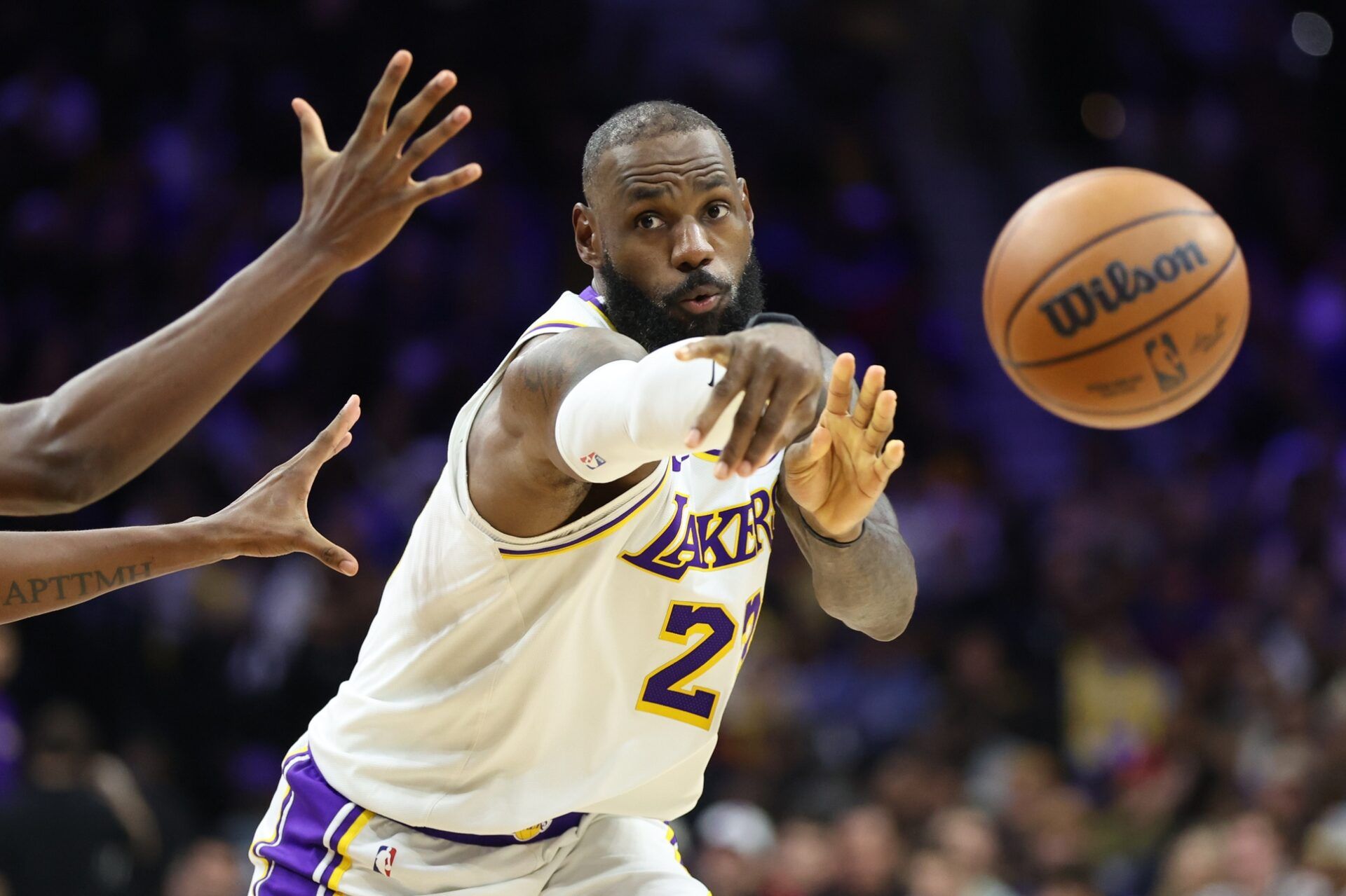 Los Angeles Lakers forward Lebron James (23) passes the ball against the Philadelphia 76ers during the fourth quarter at Xfinity Mobile Arena.