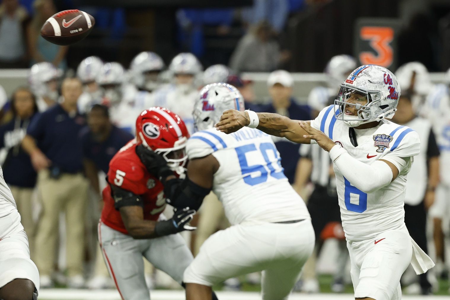 Mississippi Rebels quarterback Trinidad Chambliss (6) passes the ball Georgia Bulldogs in the fourth quarter during the 2026 Sugar Bowl and quarterfinal game of the College Football Playoff at Caesars Superdome.