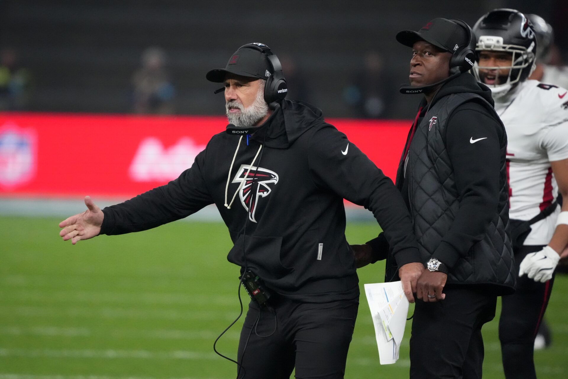 Atlanta Falcons defensive coordinator Jeff Ulbrich (left) and head coach Raheem Morris in the second half against the Atlanta Falcons during the NFL Berlin Game at Olympic Stadium.