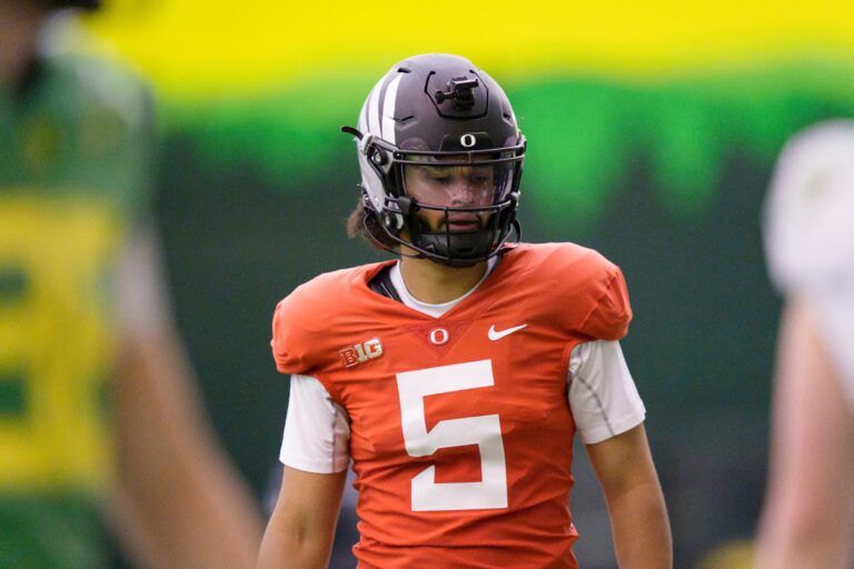 Oregon quarterback Dante Moore works out as the Oregon Ducks practice on Jan. 5, 2025, at the Moshofsky Center in Eugene, Oregon, ahead of the Peach Bowl.