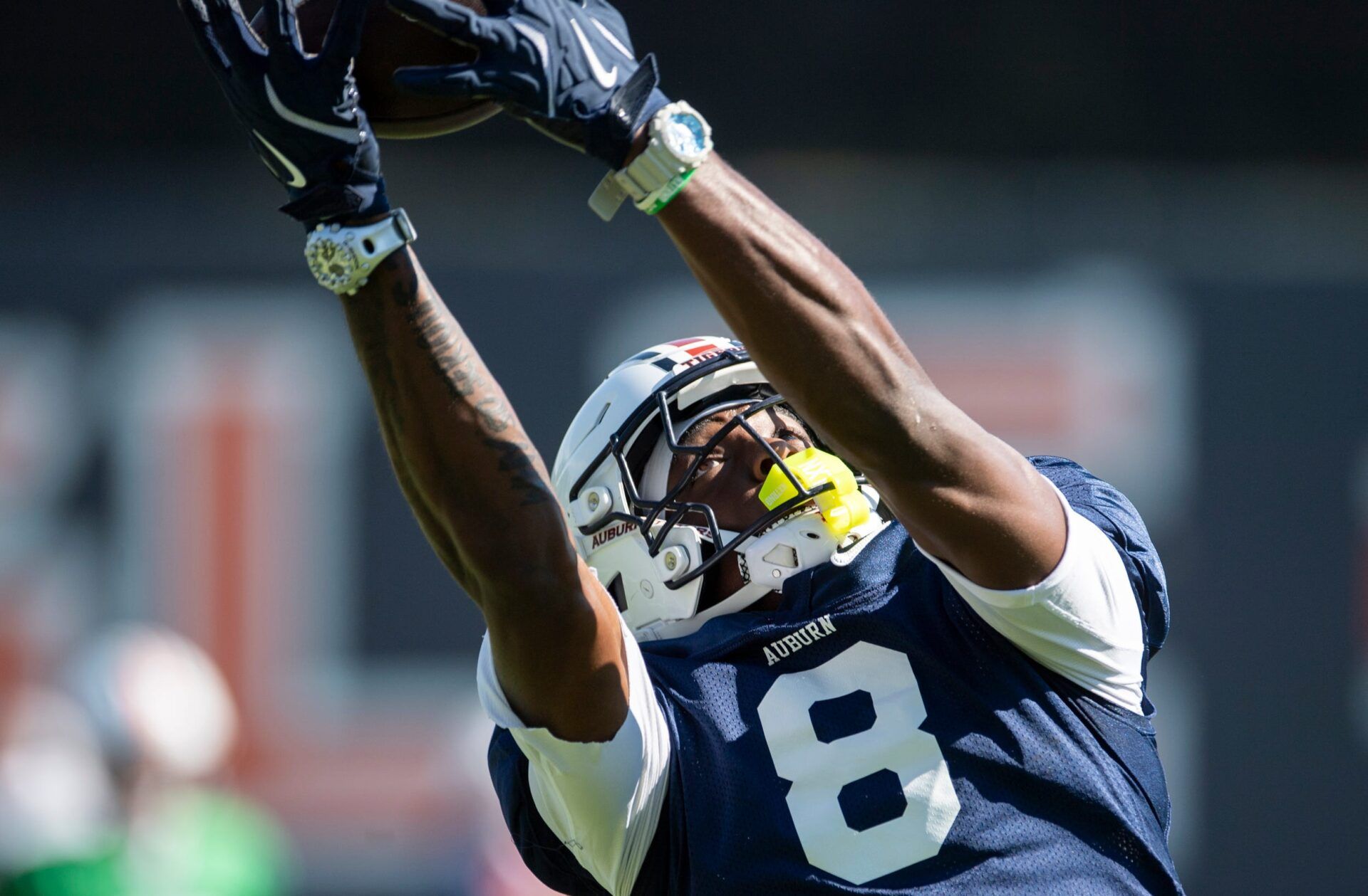 Auburn Tigers wide receiver Cam Coleman (8) catches a pass during practice at Woltosz Football Performance Center in Auburn, Ala. on Tuesday, Sept. 2, 2025.