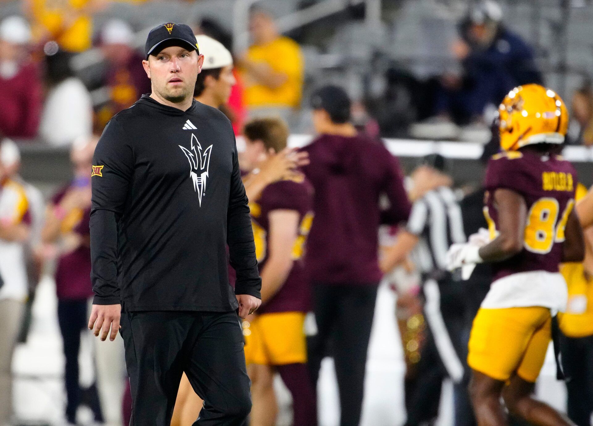 Arizona State head coach Kenny Dillingham walks the field prior to a game against Arizona at Mountain America Stadium in Tempe, on Nov. 28, 2025.