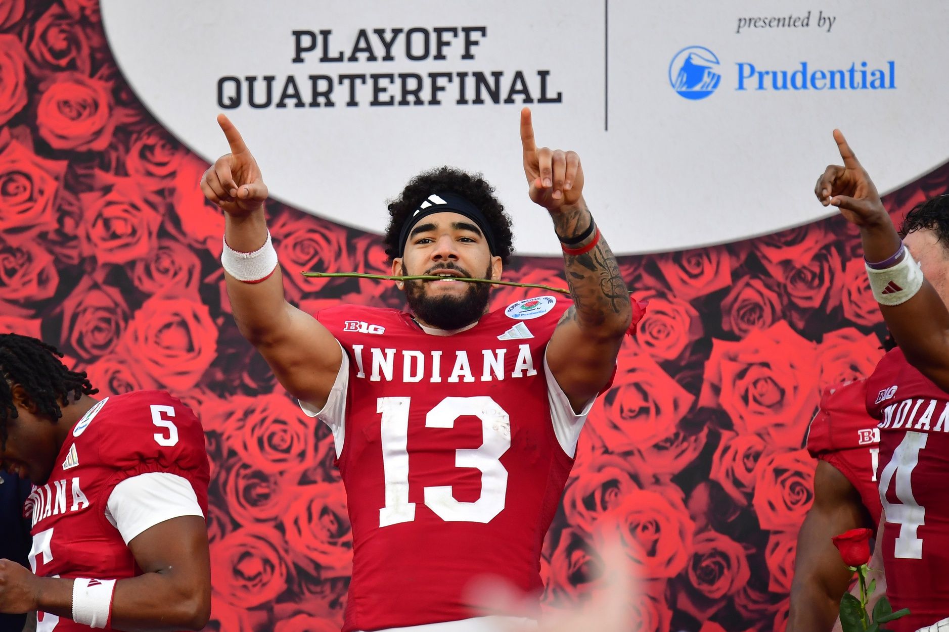 Indiana Hoosiers wide receiver Elijah Sarratt (13) celebrates on the podium after defeating the Alabama Crimson Tide in the 2026 Rose Bowl and quarterfinal game of the College Football Playoff at Rose Bowl Stadium.