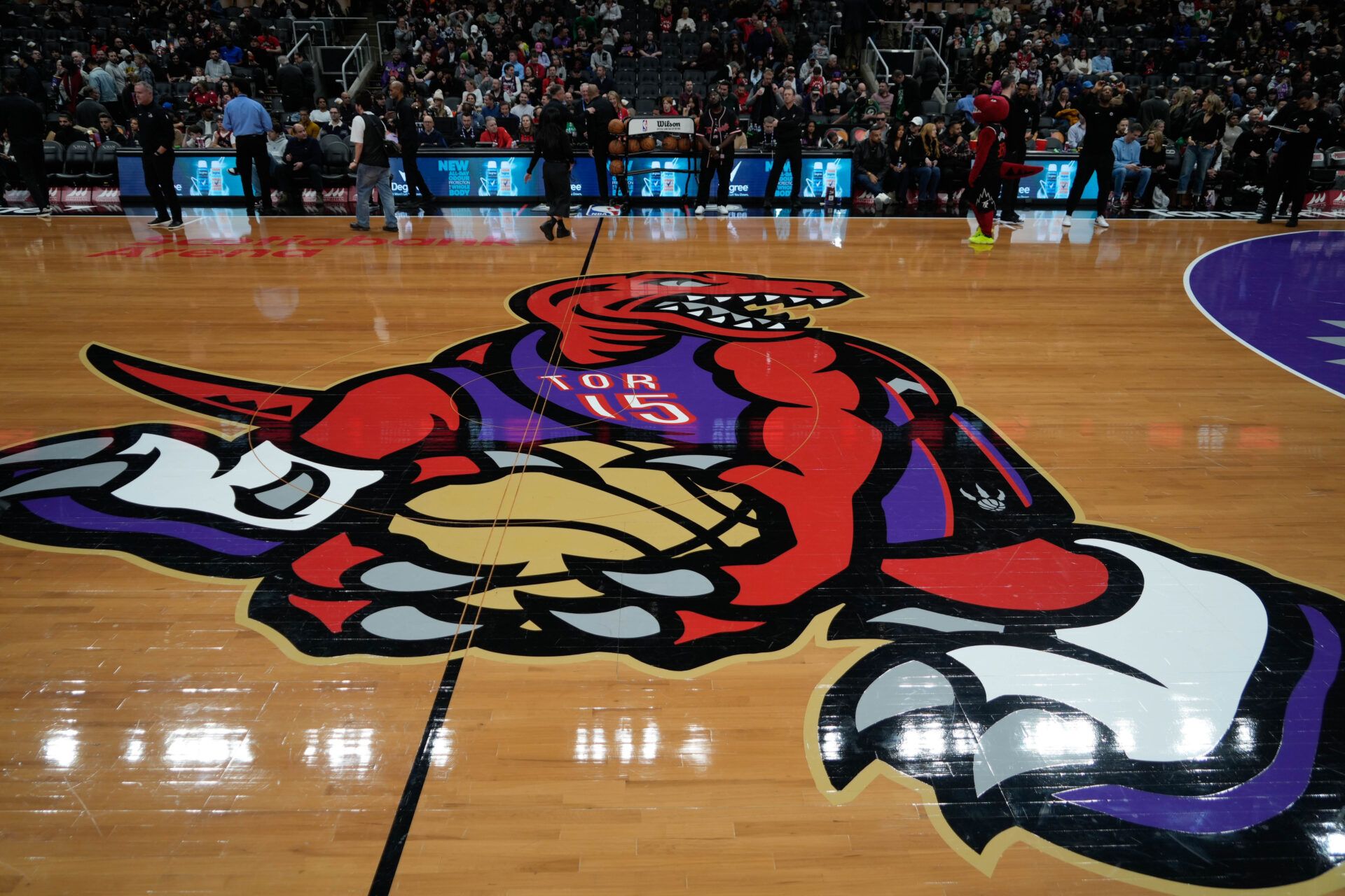 A view of the Toronto Raptors logo at center court for its city connect game against the Boston Celtics at Scotiabank Arena.
