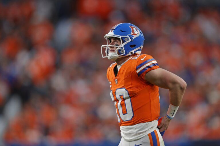 Denver Broncos quarterback Bo Nix (10) looks on during the second half against the Los Angeles Chargers at Empower Field at Mile High.