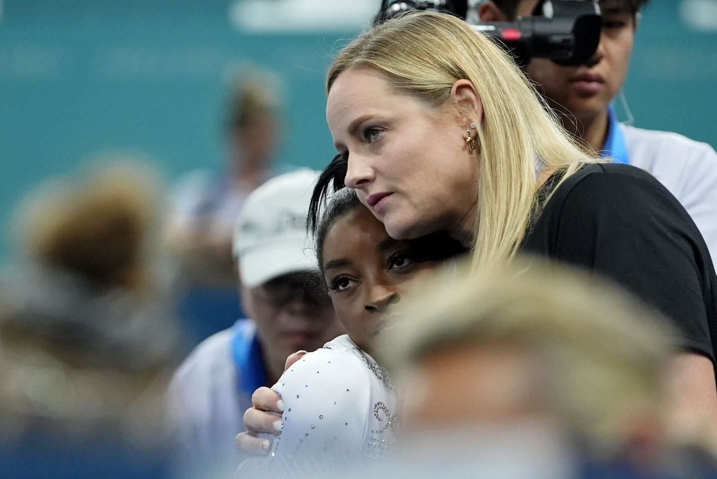 Simone Biles of the United States reacts with coach Cecile Landi after competing on the beam on day three of the gymnastics event finals during the Paris 2024 Olympic Summer Games.