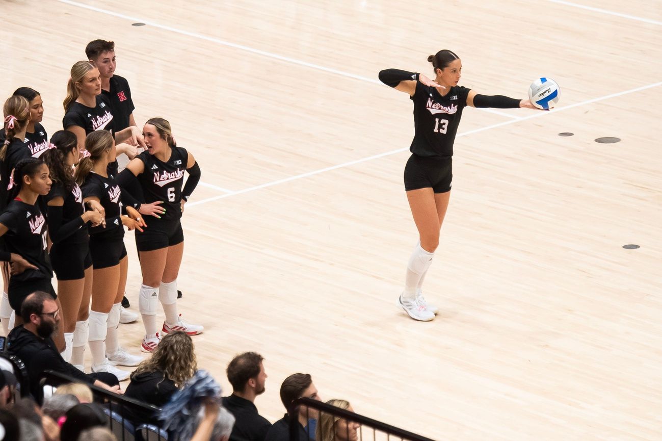 Nebraska's Merritt Beason (13) prepares to serve during a Big Ten volleyball match against Penn State at Rec Hall on Friday, Nov. 29, 2024, in State College, Pa.
