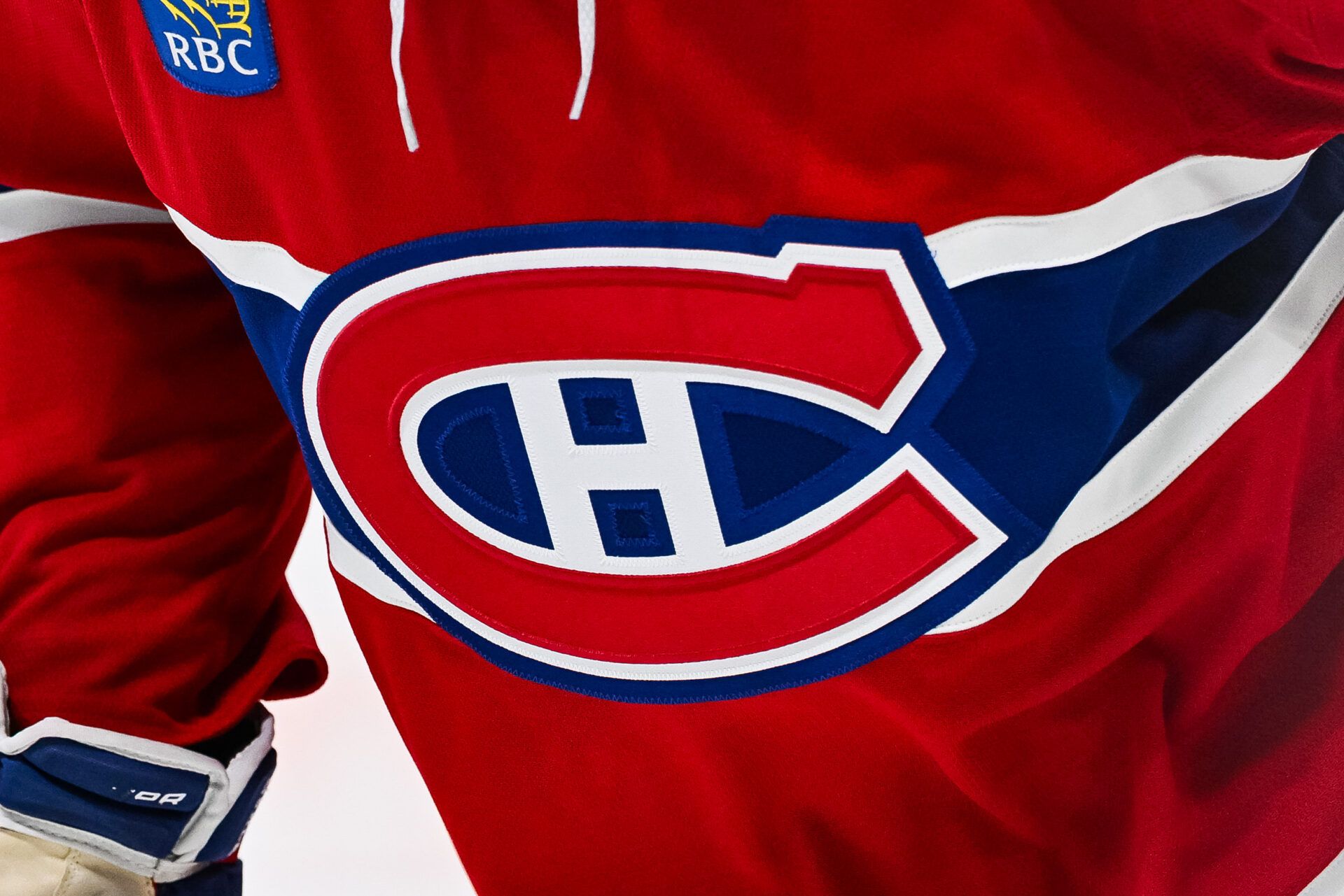 View of a Montreal Canadiens logo on a jersey worn by a member of the team at Bell Centre.